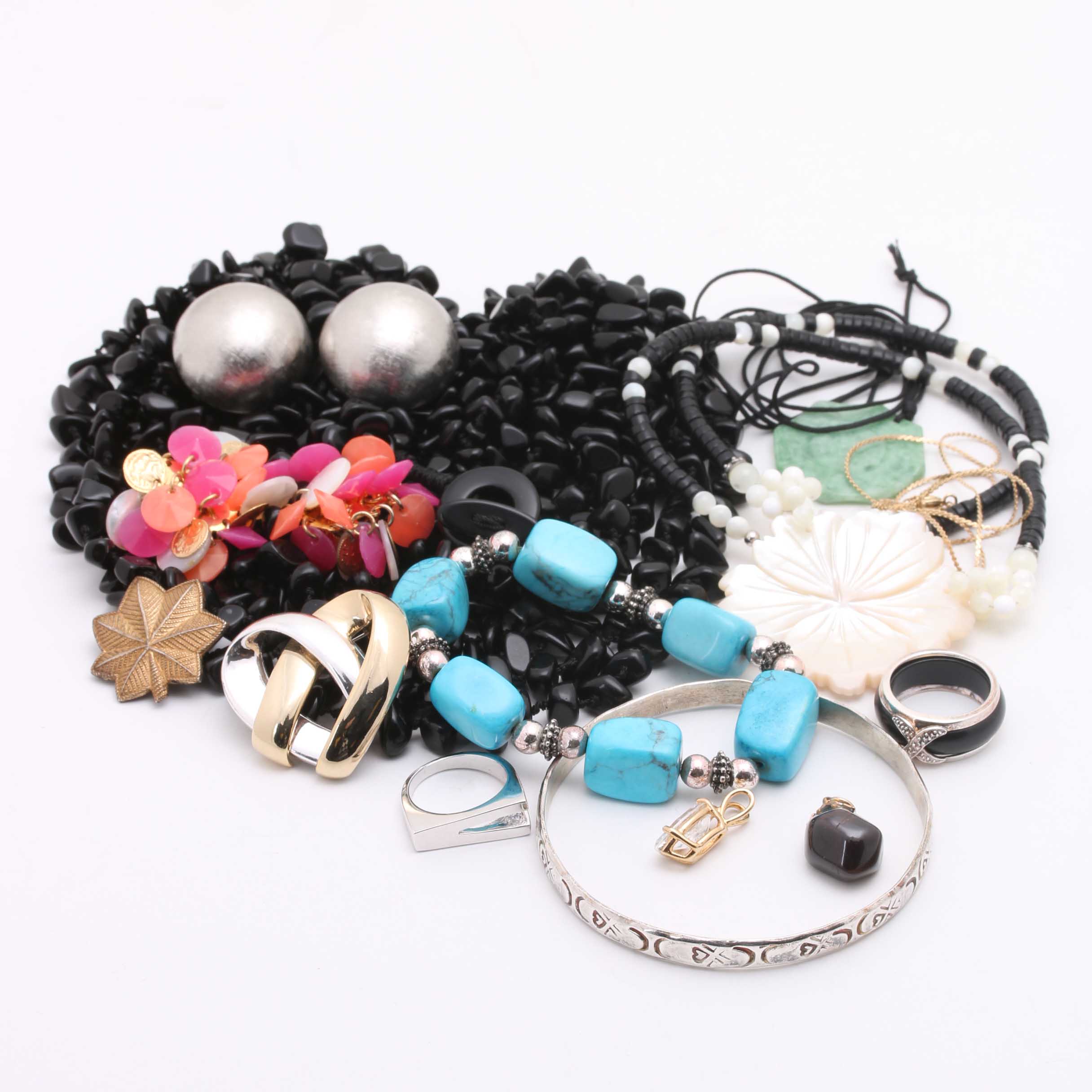 Assortment of Silver and Gold Tone Costume Jewelry