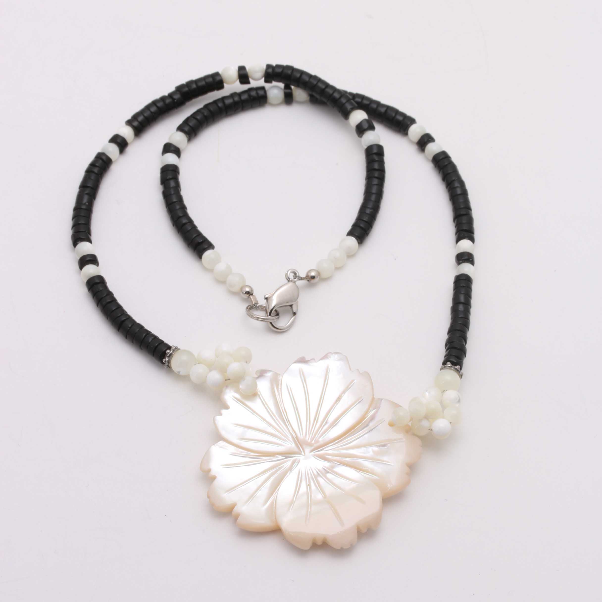 Assortment of Silver and Gold Tone Costume Jewelry