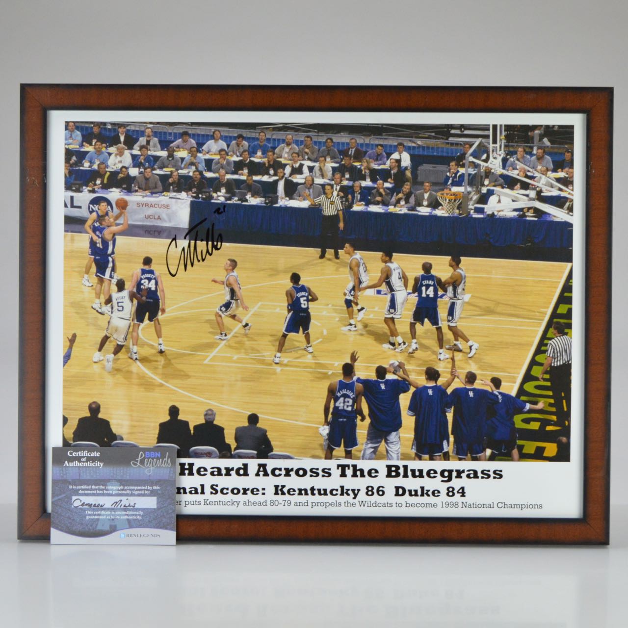 Framed Poster "Shot Heard Across the Bluegrass-Final Score: Kentucky 86 Duke 84/Cameron Mills' 3-Pointer puts Kentucky ahead 80-79 and propels the Wildcats to become 1998 National Champions" Autographed by Cameron MIlls with COA