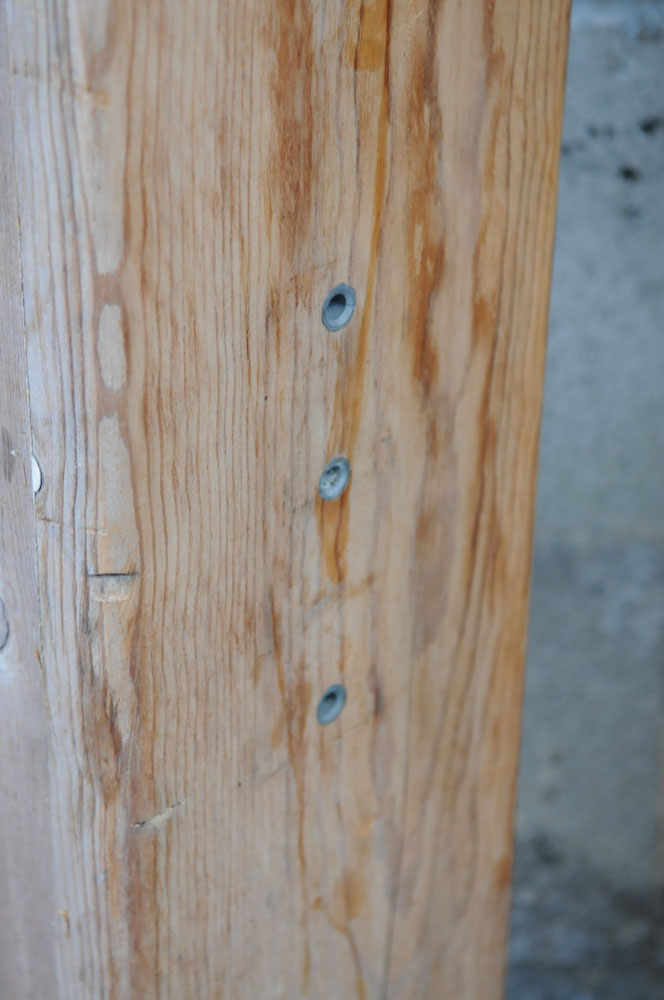 Two Wooden Bed Posts