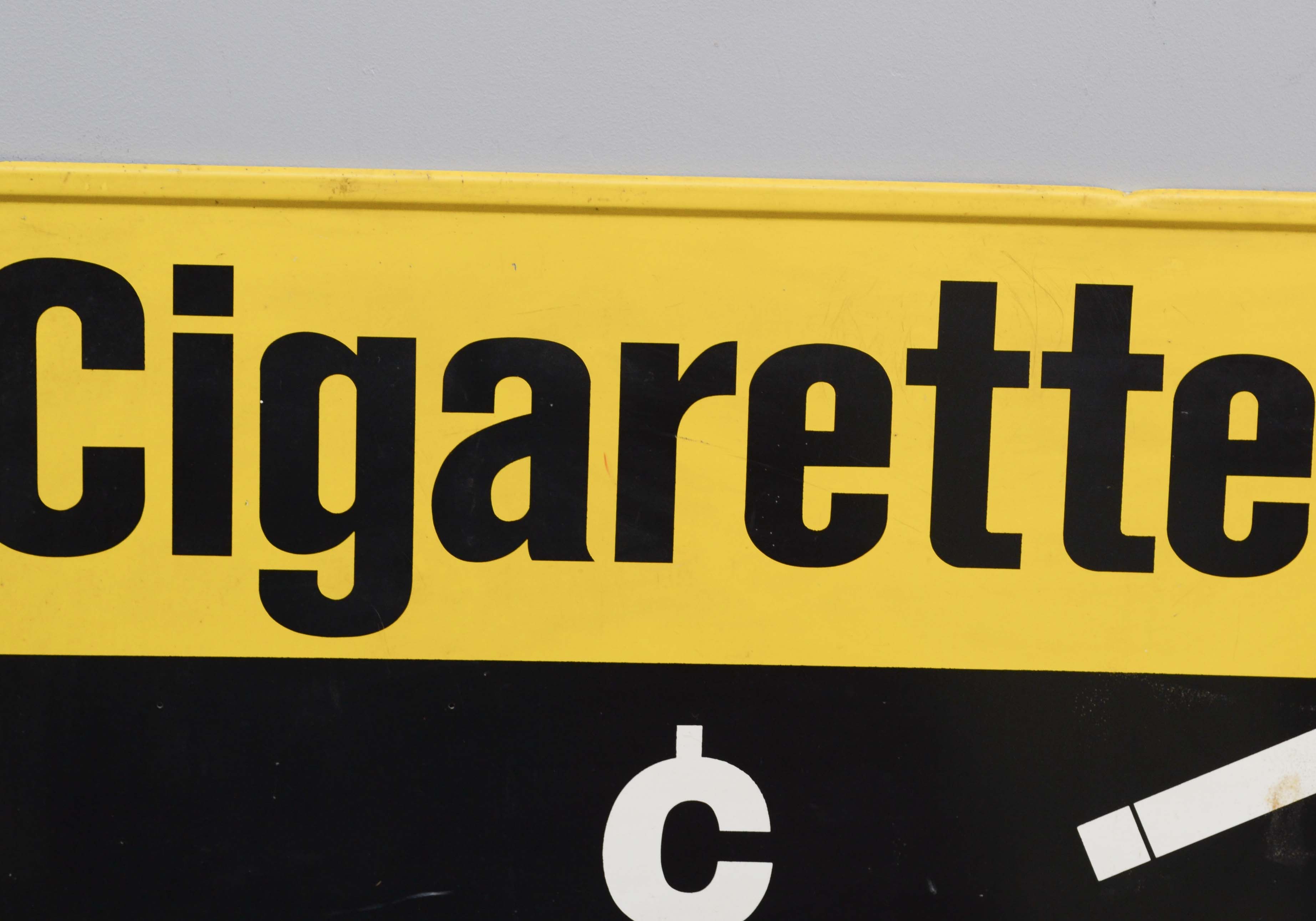 Vintage Black and Yellow Metal Cigarette Sign