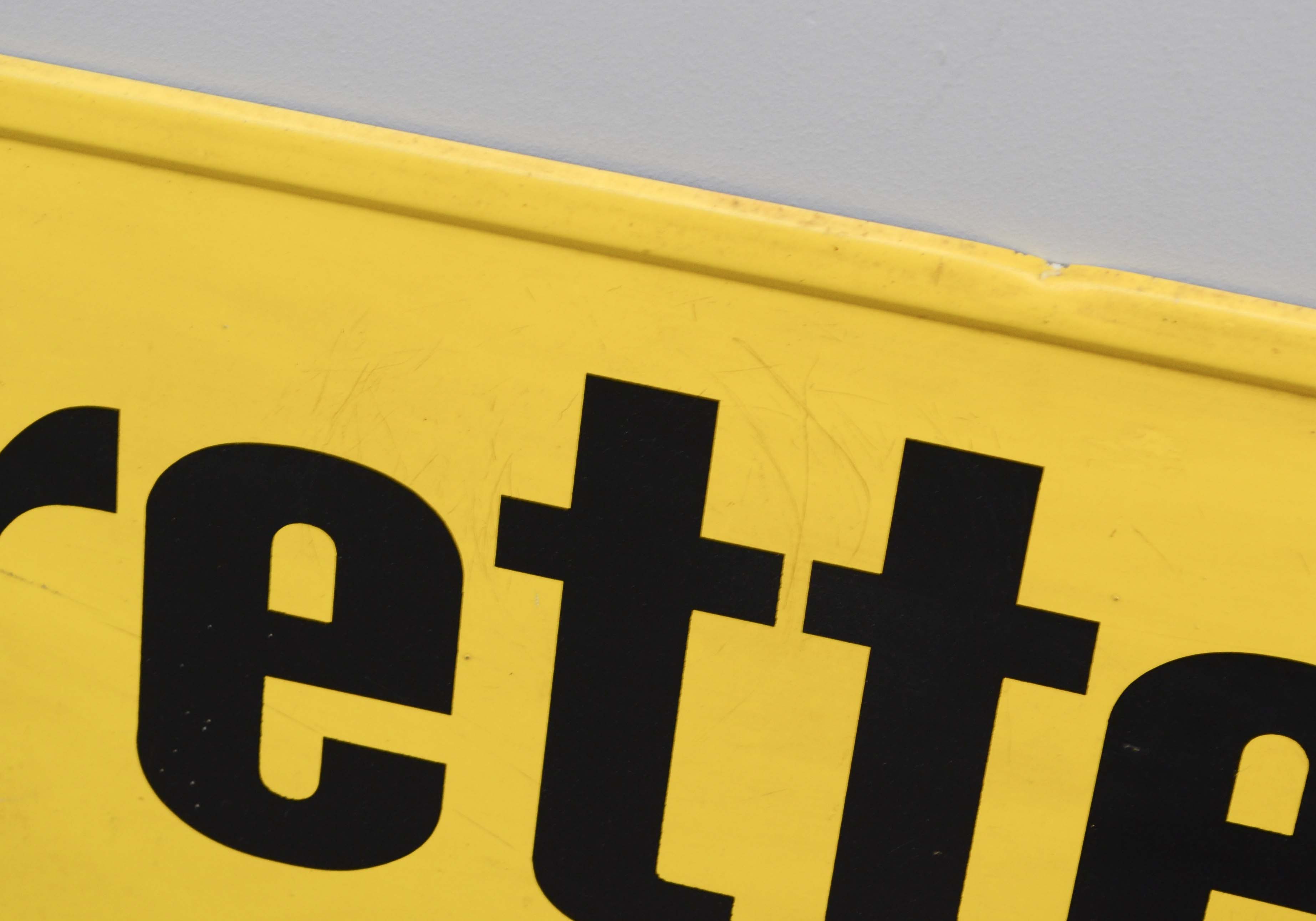 Vintage Black and Yellow Metal Cigarette Sign