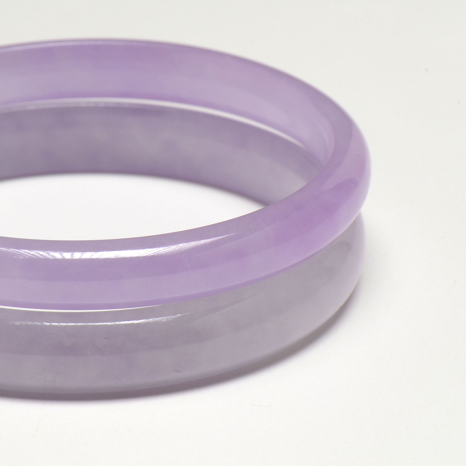 Two Polished Dyed Lavender Jadeite Bangle Bracelets