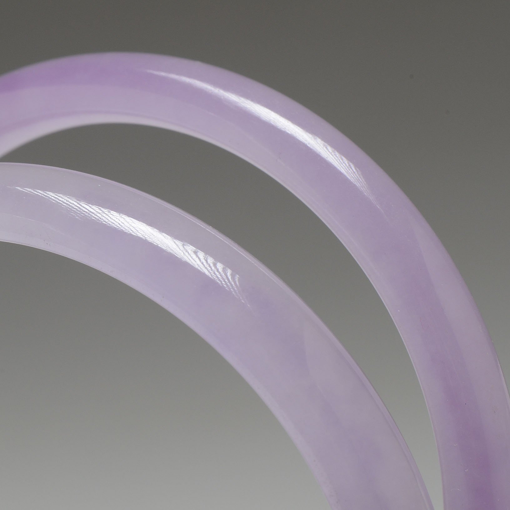 Two Polished Dyed Lavender Jadeite Bangle Bracelets