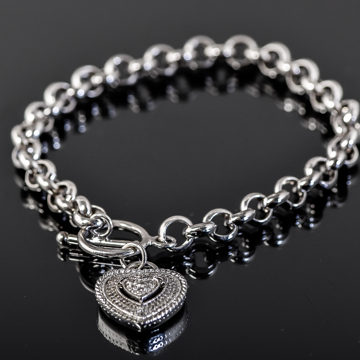 Sterling Silver and Cubic Zirconia Heart Charm Bracelet