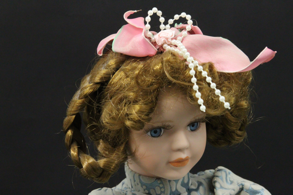 Collectors Choice "Carolyn" Porcelain Musical Doll