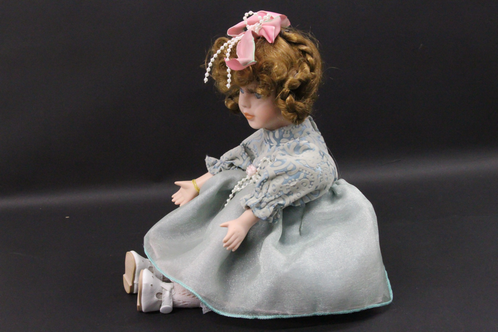 Collectors Choice "Carolyn" Porcelain Musical Doll