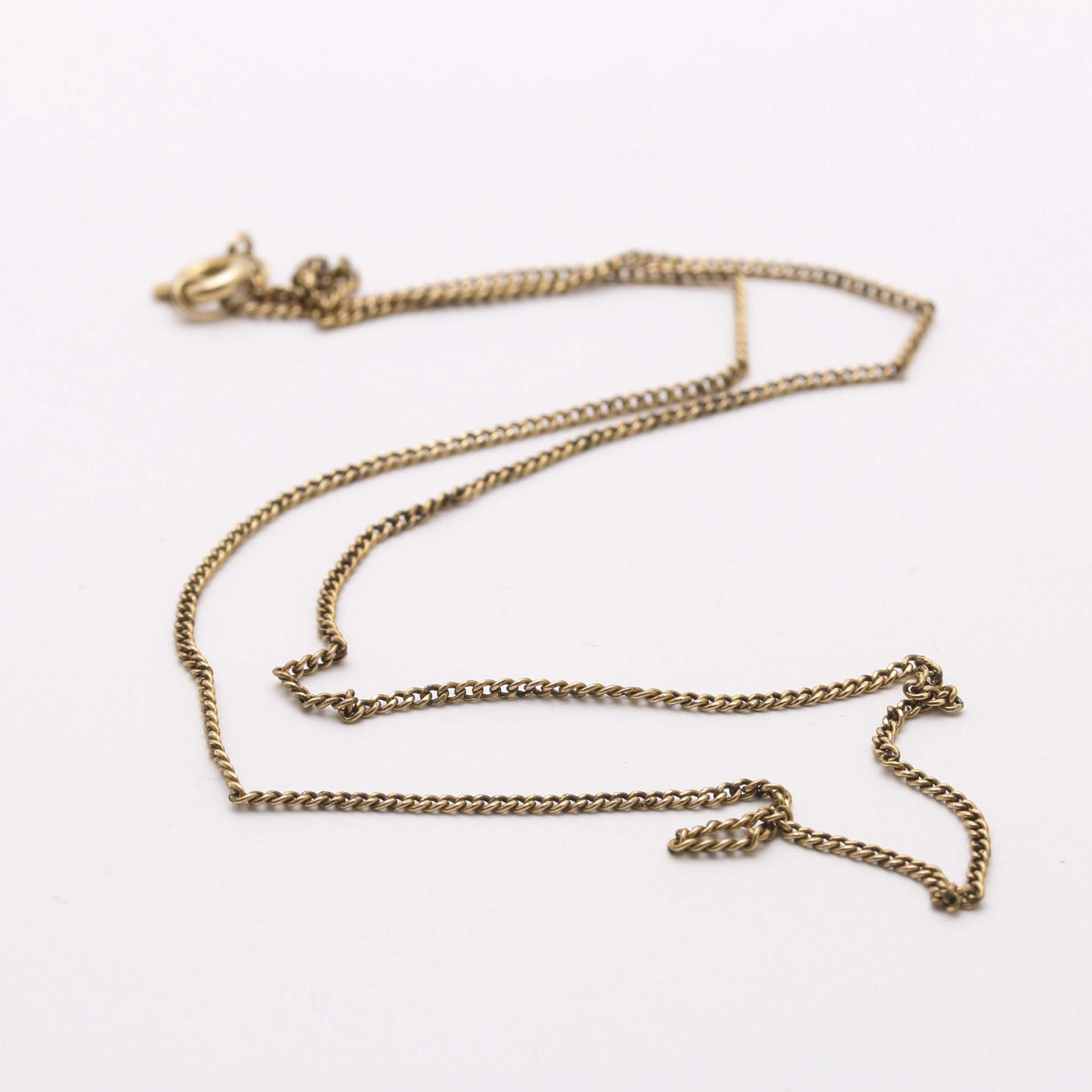 Gold and Silver Tone Trifari, Swarovski, and Napier Jewelry