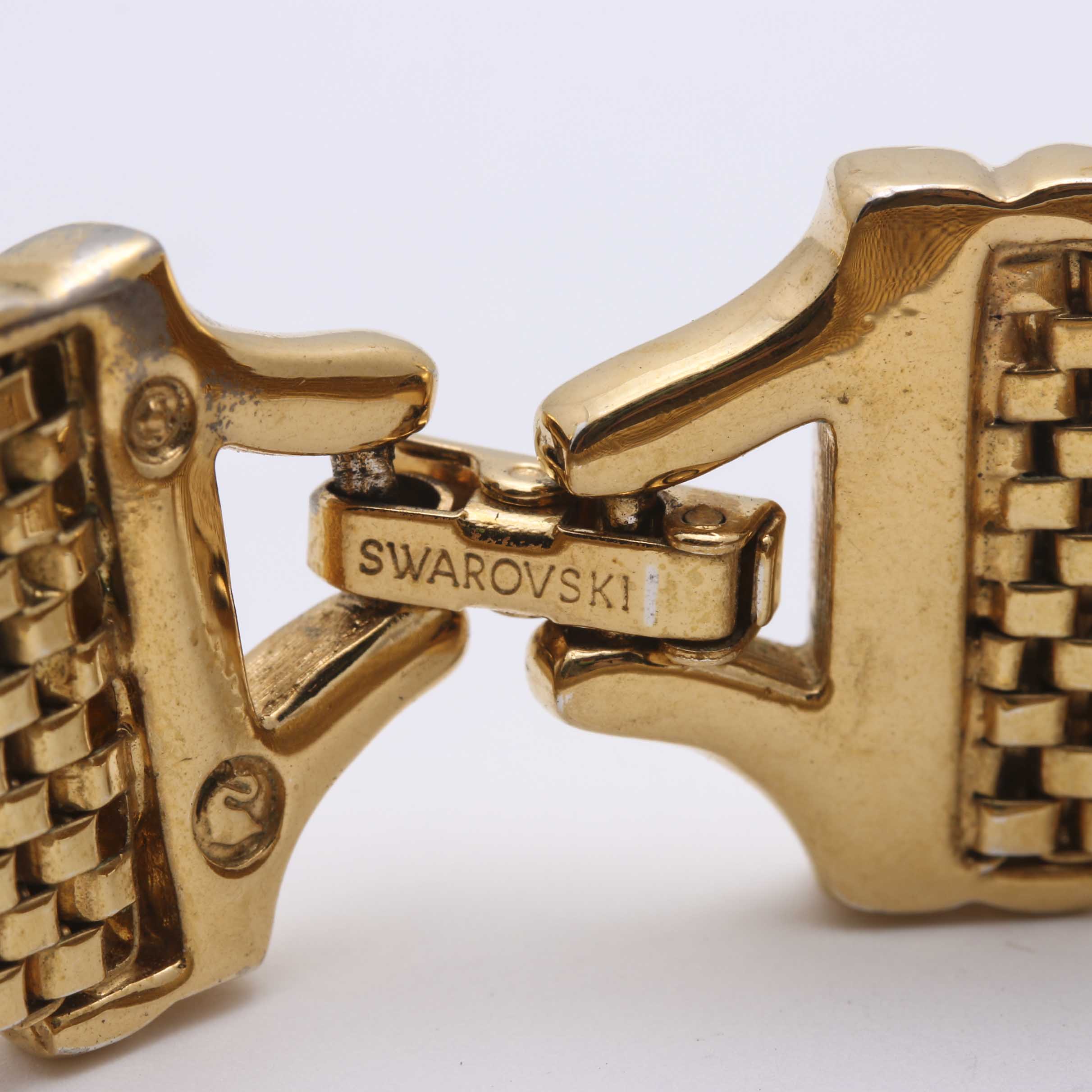 Gold and Silver Tone Trifari, Swarovski, and Napier Jewelry