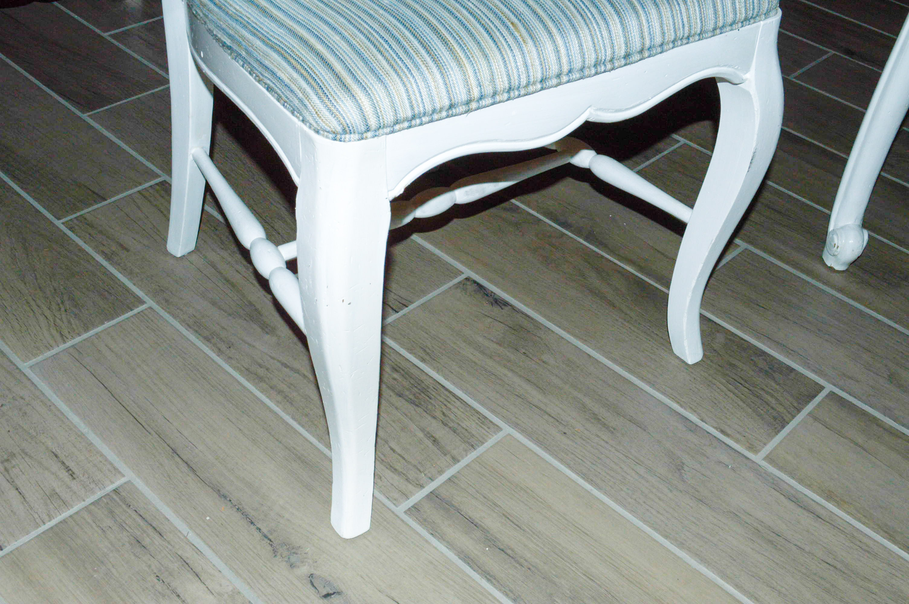 White Wood Table with Cane Back Chairs