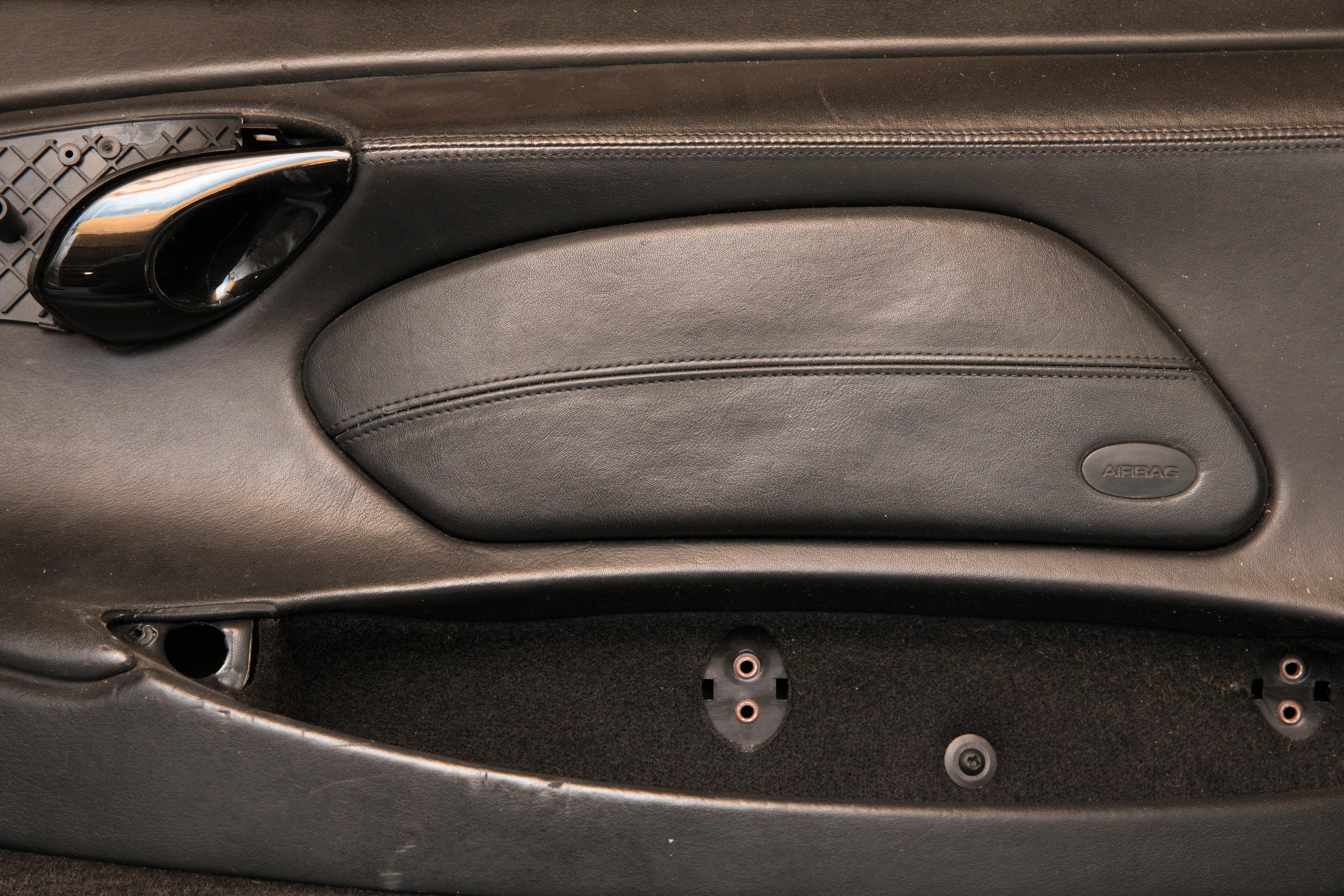 Four Black Interior Car Door Panels