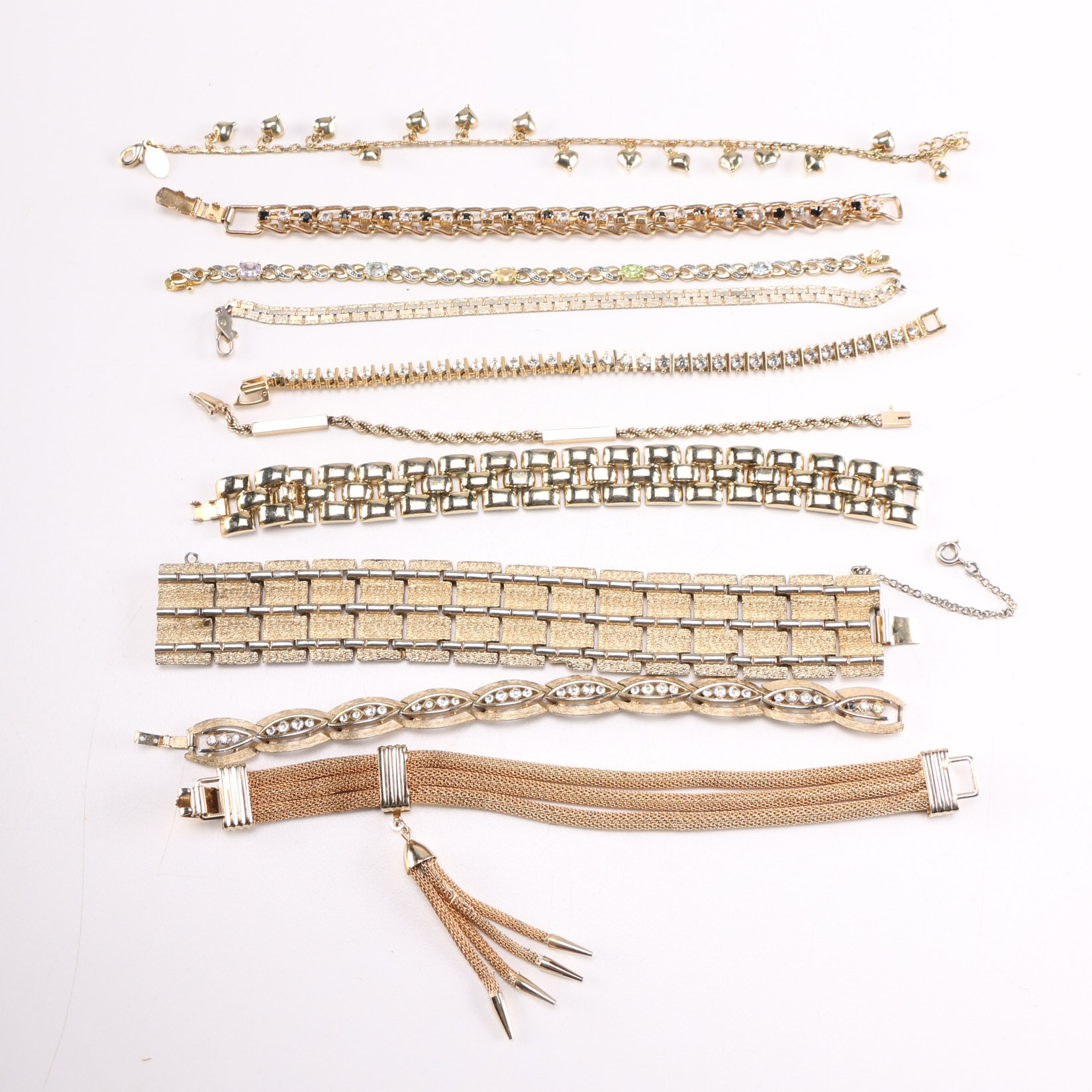 Collection of Gold Toned Metal Bracelets