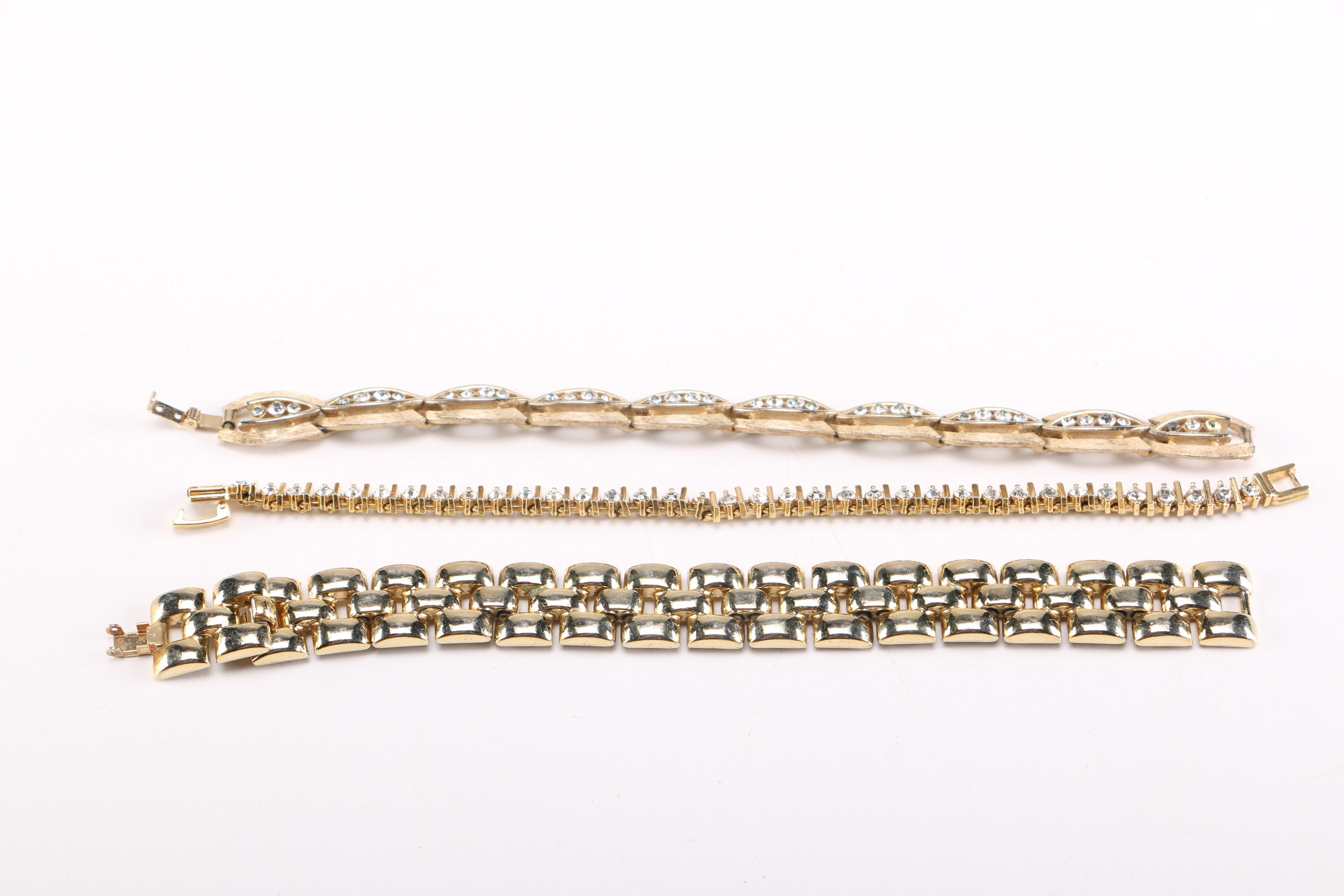 Collection of Gold Toned Metal Bracelets