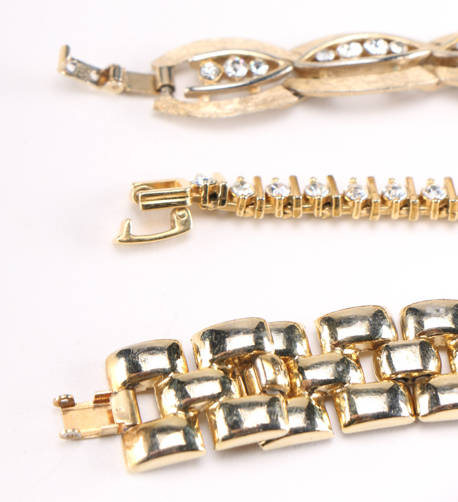 Collection of Gold Toned Metal Bracelets