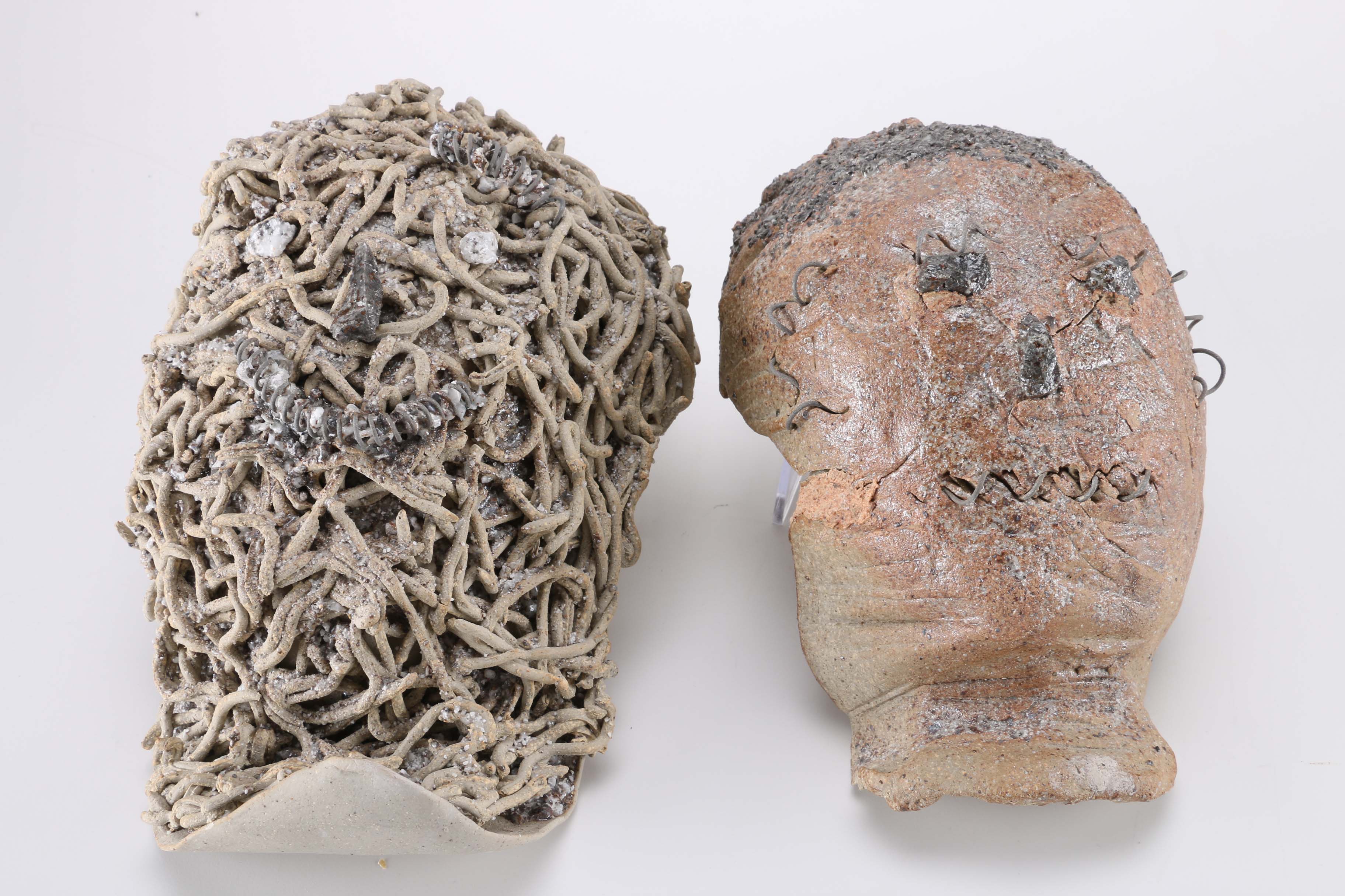 Concrete and Metal Face Sculptures by Donald S. Wilson