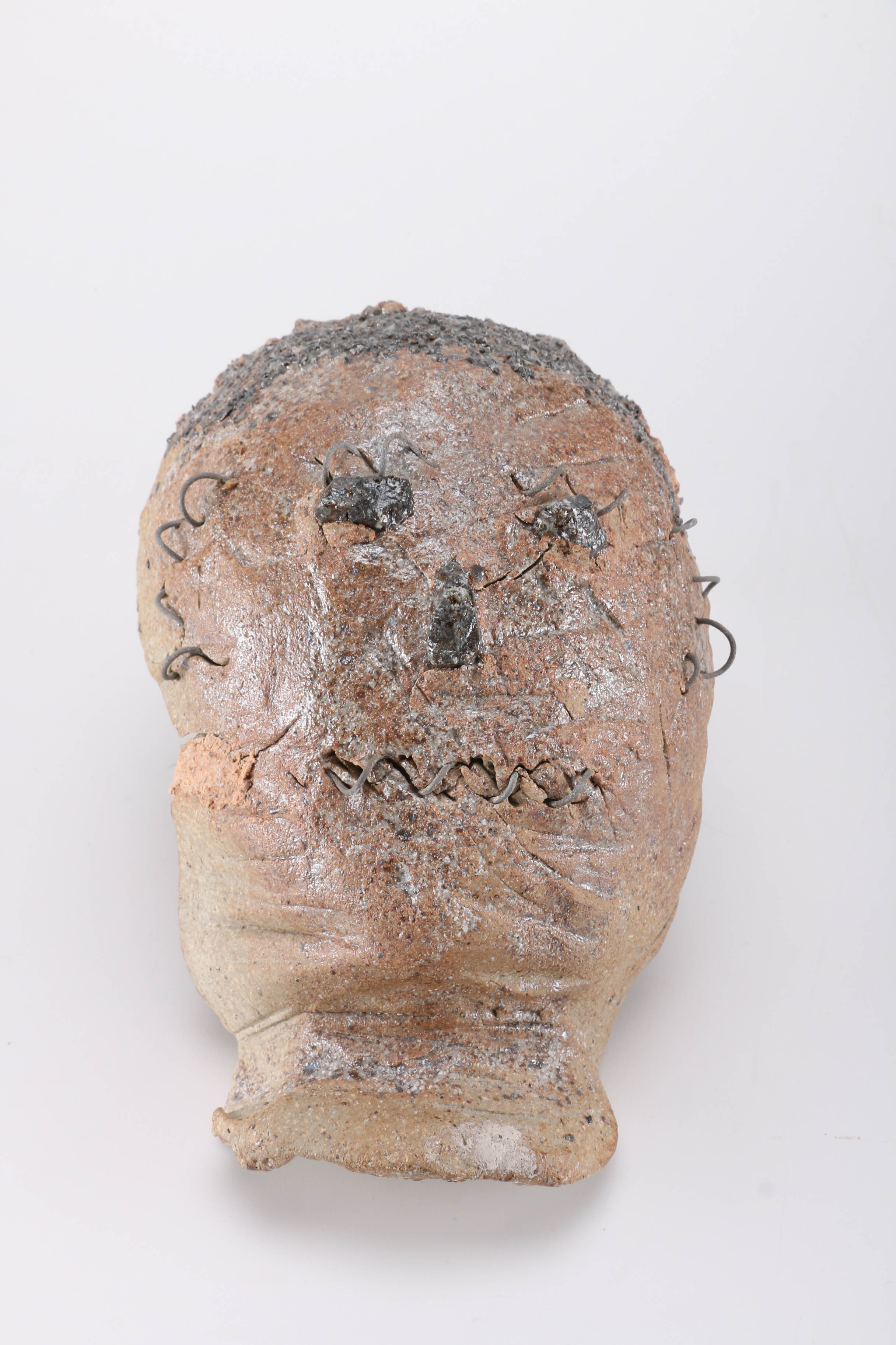 Concrete and Metal Face Sculptures by Donald S. Wilson