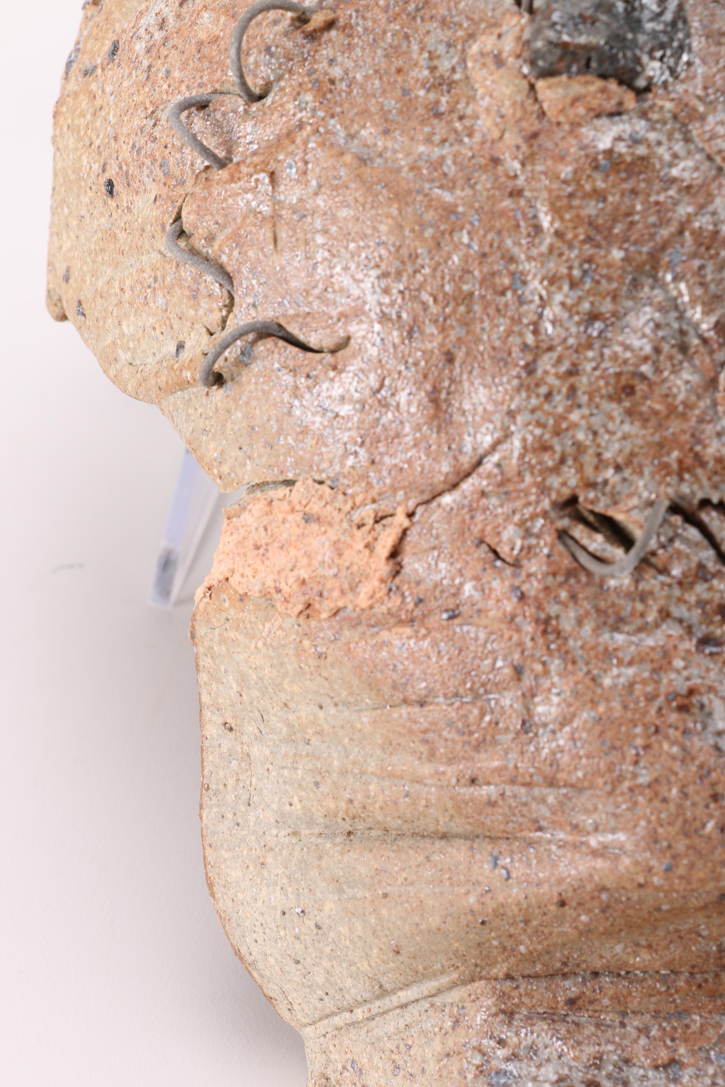 Concrete and Metal Face Sculptures by Donald S. Wilson