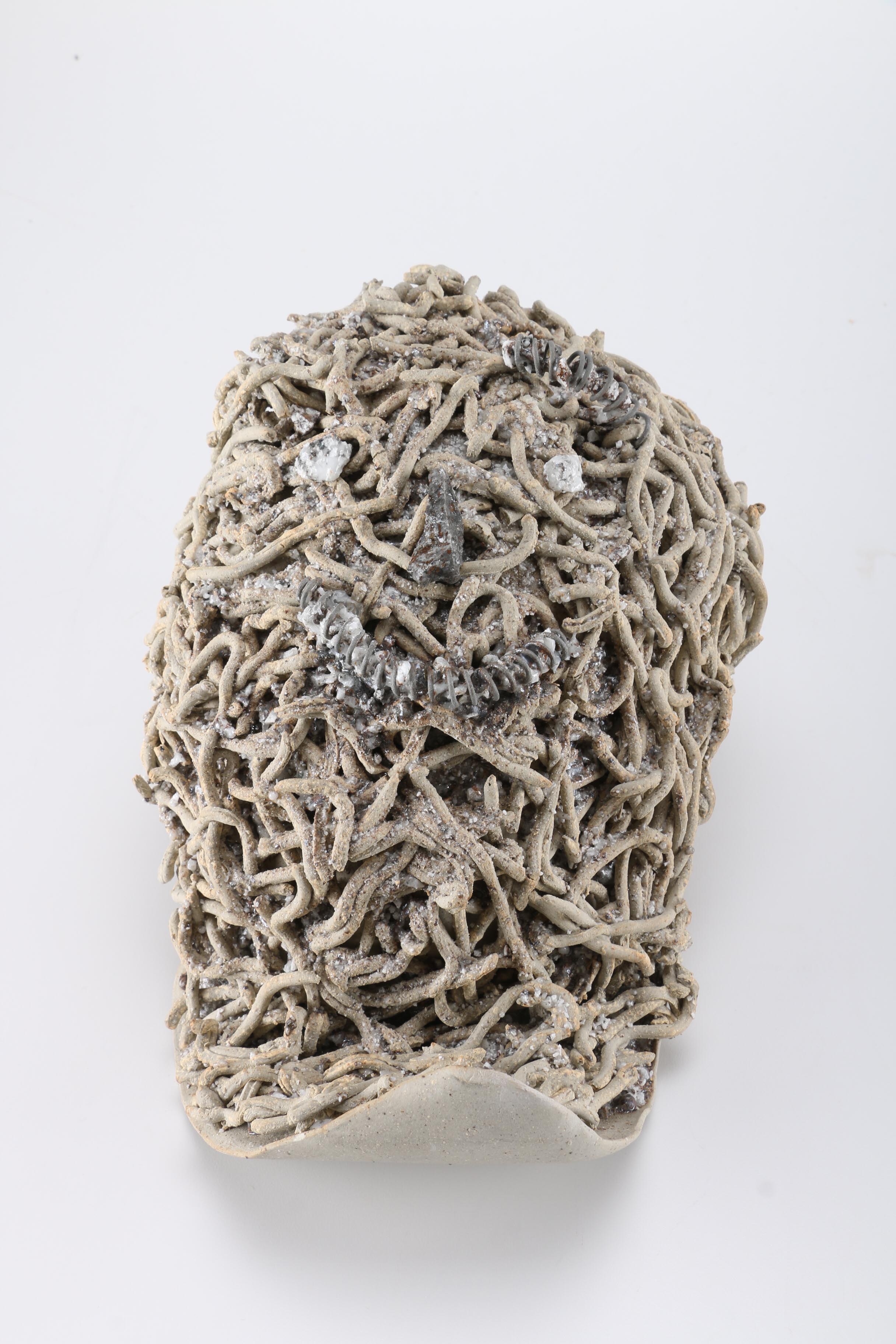 Concrete and Metal Face Sculptures by Donald S. Wilson