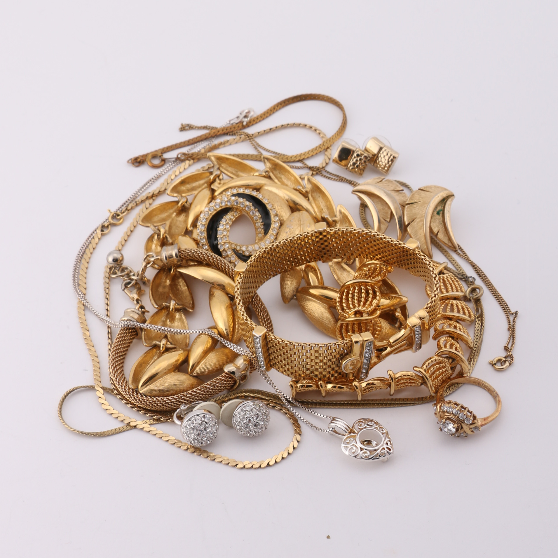 Gold and Silver Tone Trifari, Swarovski, and Napier Jewelry