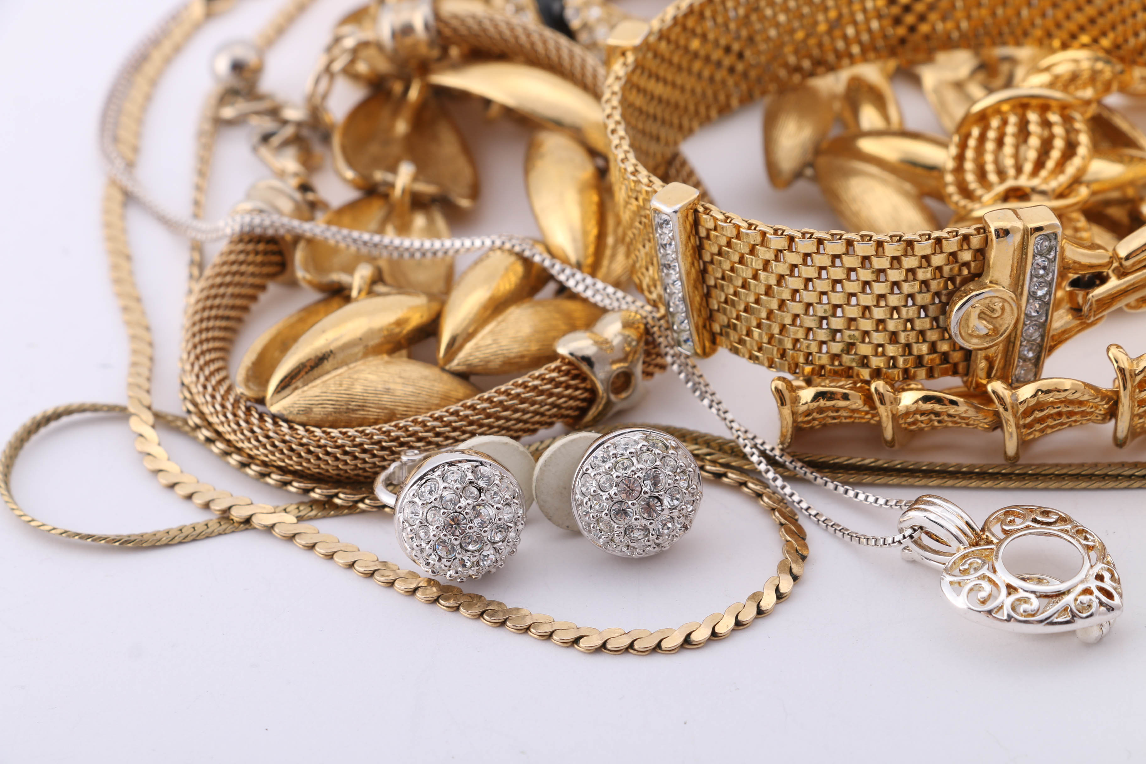 Gold and Silver Tone Trifari, Swarovski, and Napier Jewelry