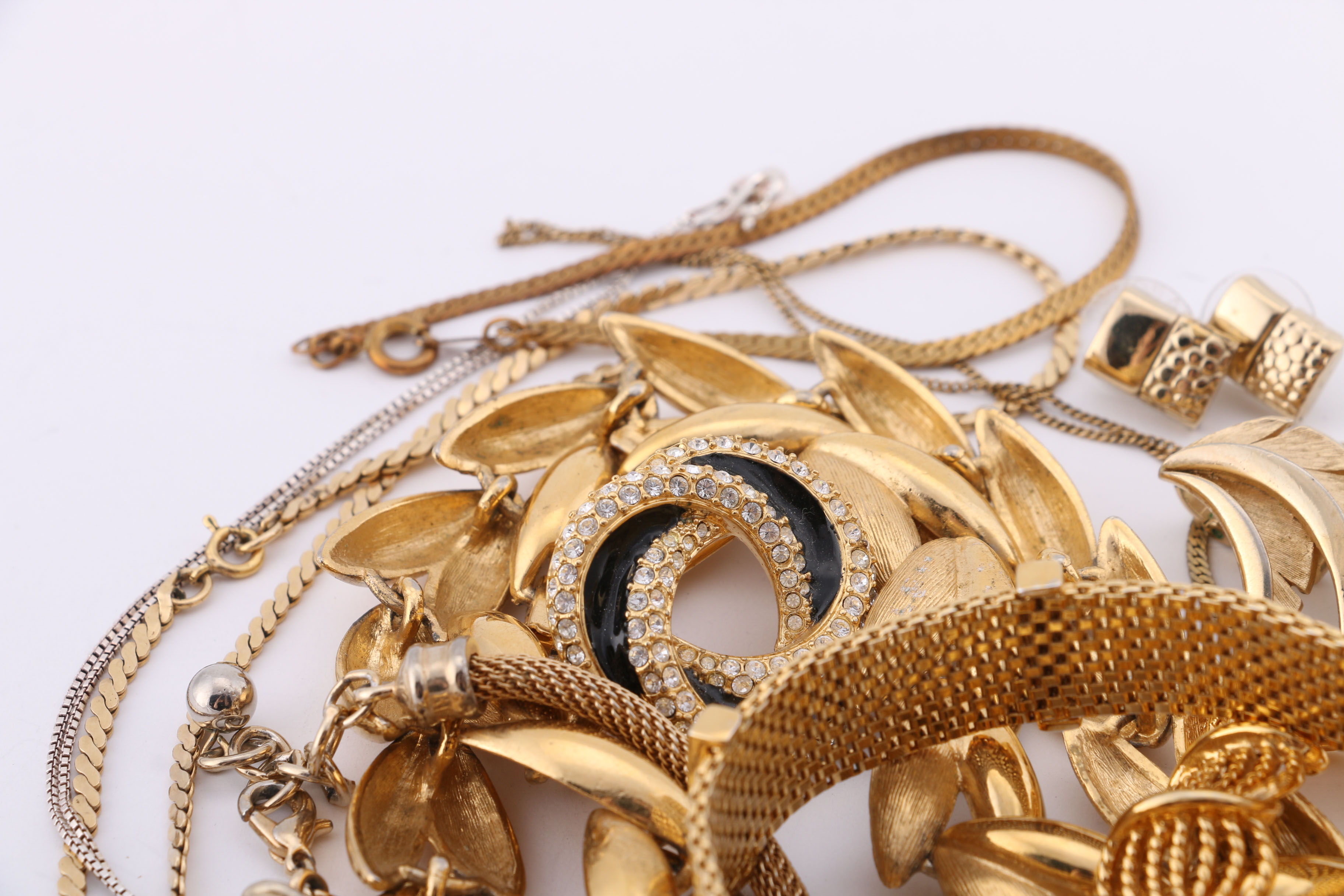 Gold and Silver Tone Trifari, Swarovski, and Napier Jewelry