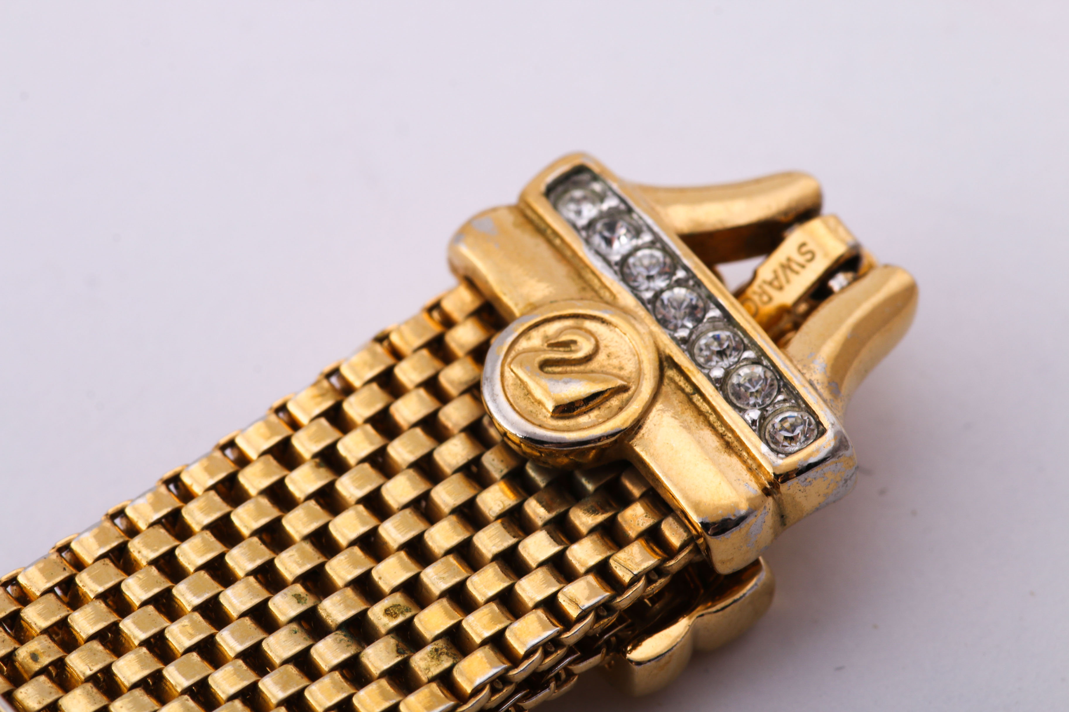 Gold and Silver Tone Trifari, Swarovski, and Napier Jewelry