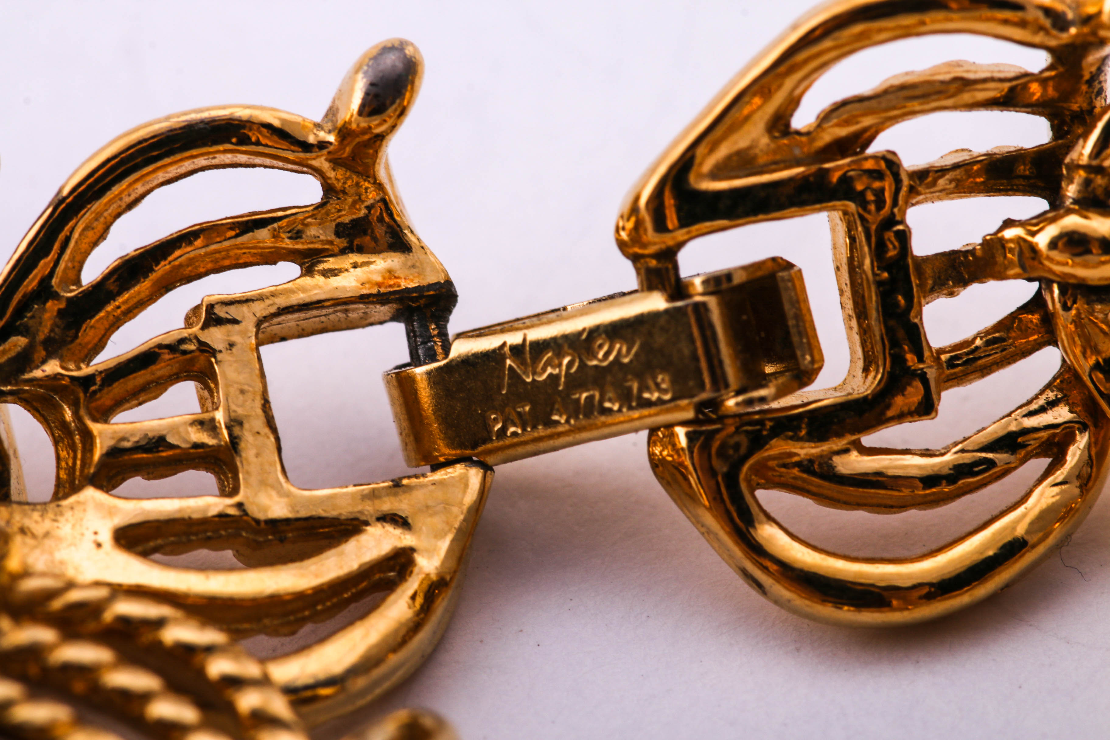 Gold and Silver Tone Trifari, Swarovski, and Napier Jewelry