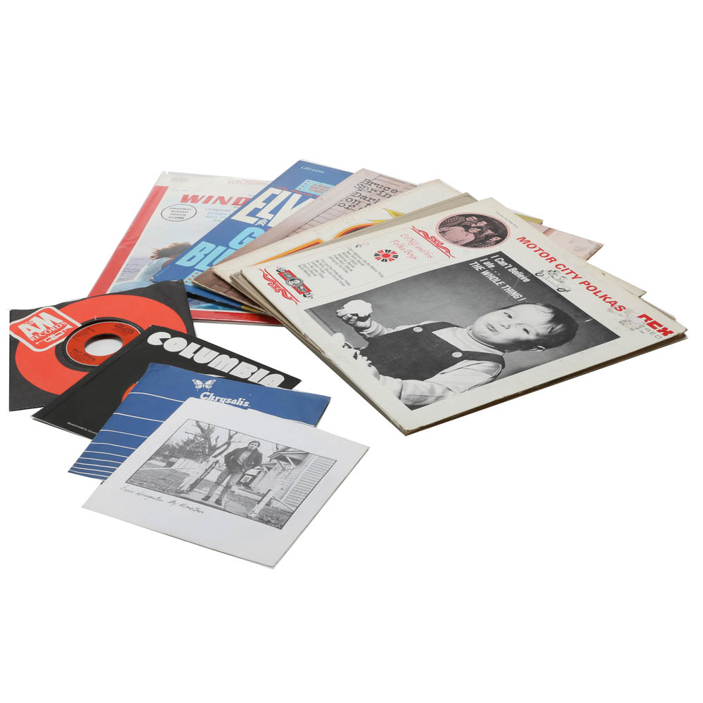 Assortment of Vintage 12" and 45 RPM Records