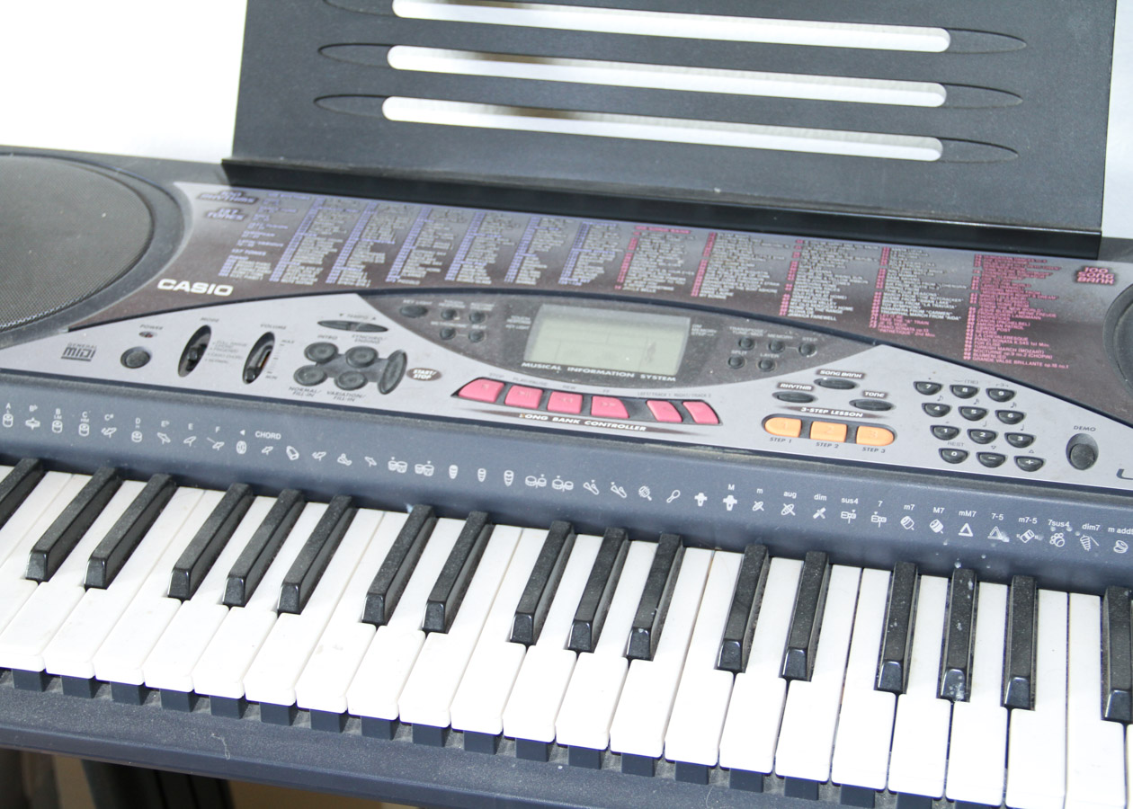 Casio LK-50 Electronic Keyboard With Stand