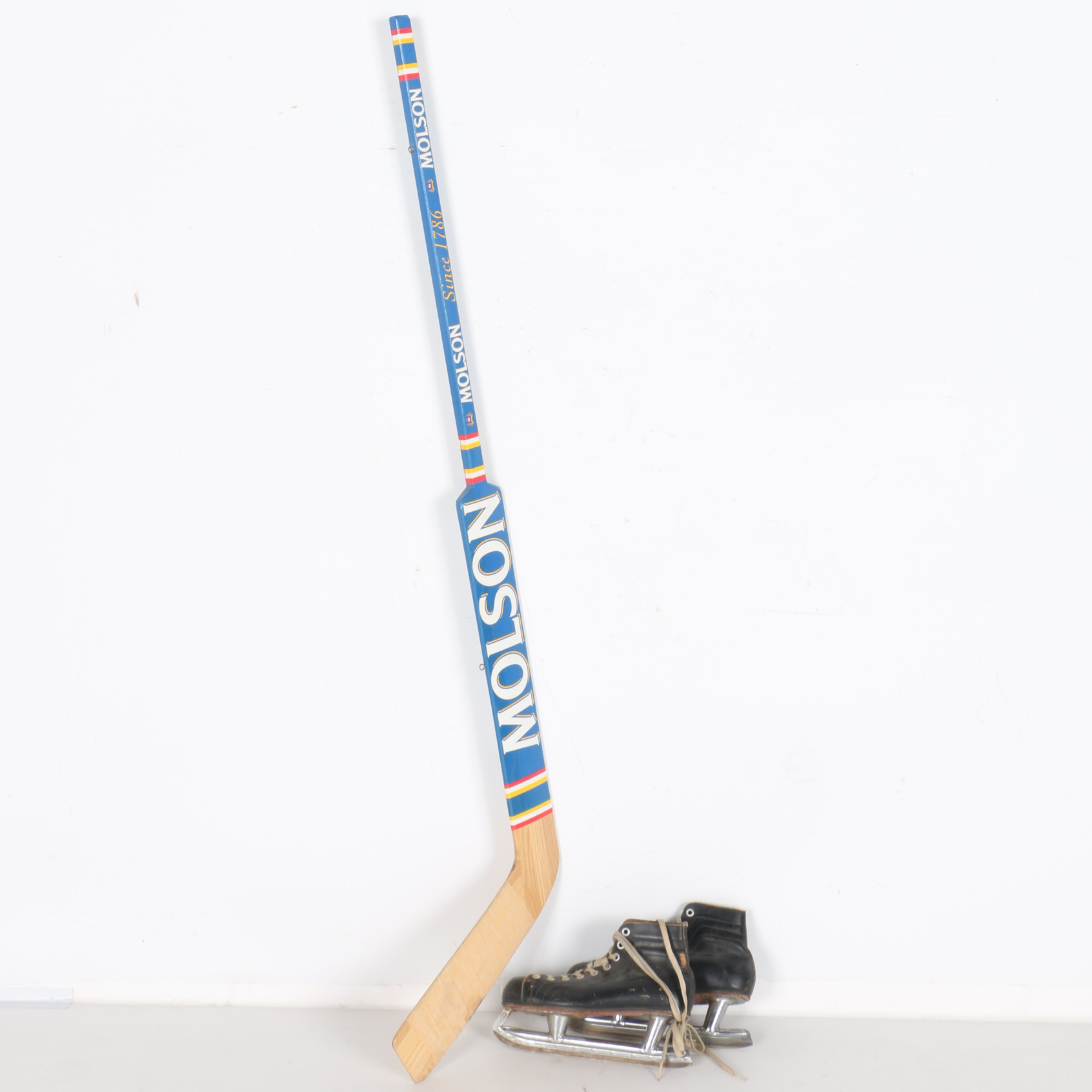 Vintage Ice Skates and Molson Hockey Stick