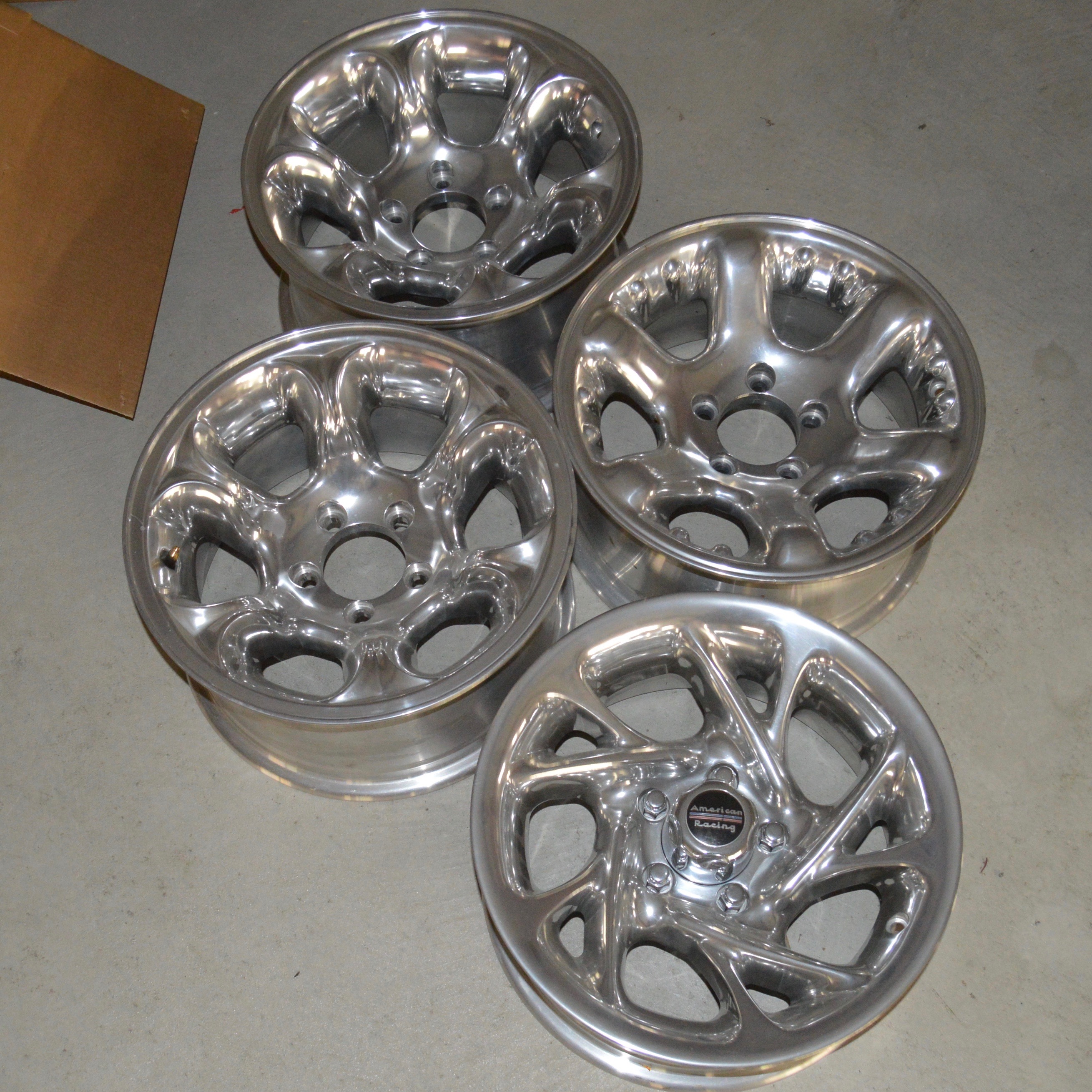 Assortment of Four Volkswagen Dune Buggy Chrome Tire Rims