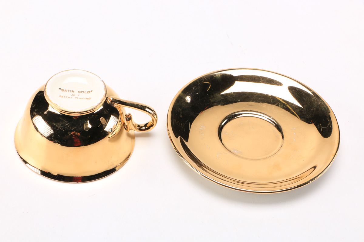Atlas China Style 22K Gold Dipped Tea Cup And Saucer