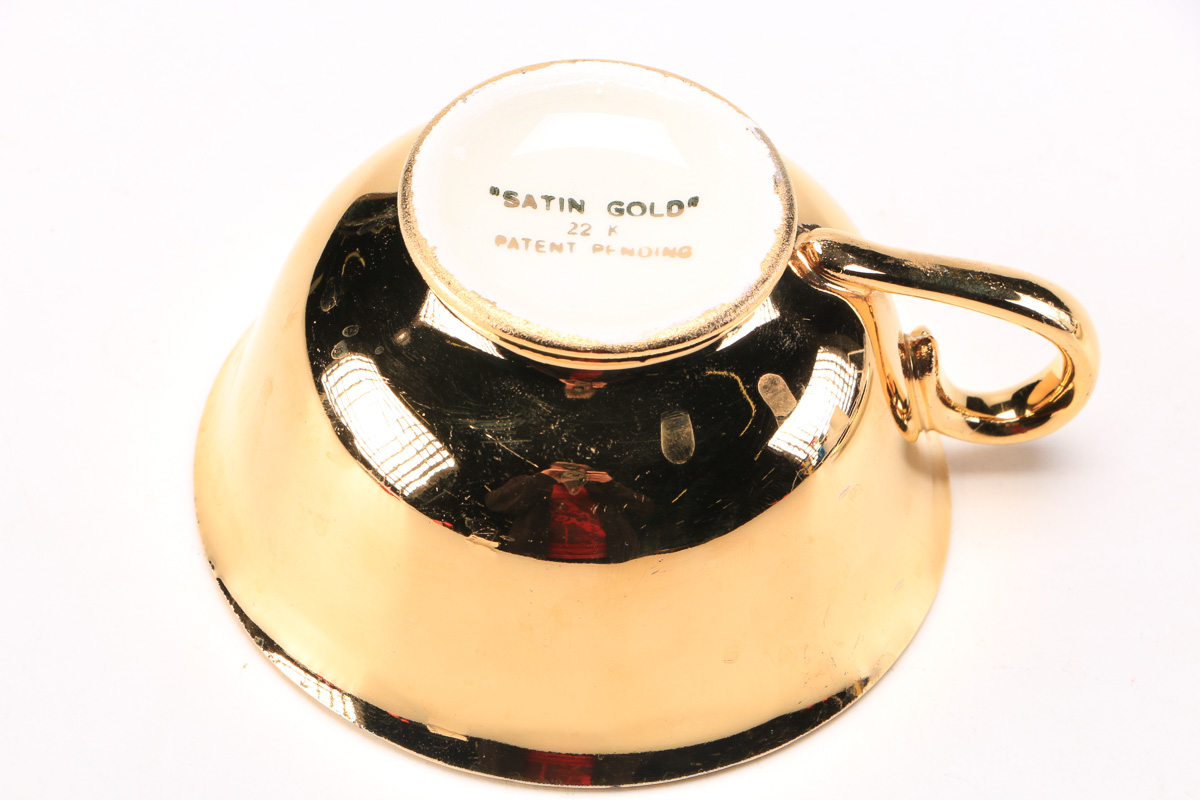 Atlas China Style 22K Gold Dipped Tea Cup And Saucer