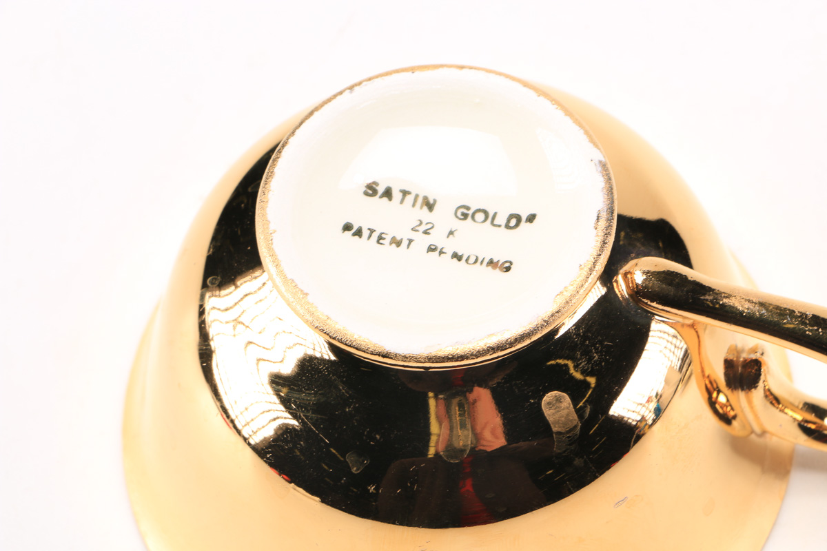 Atlas China Style 22K Gold Dipped Tea Cup And Saucer