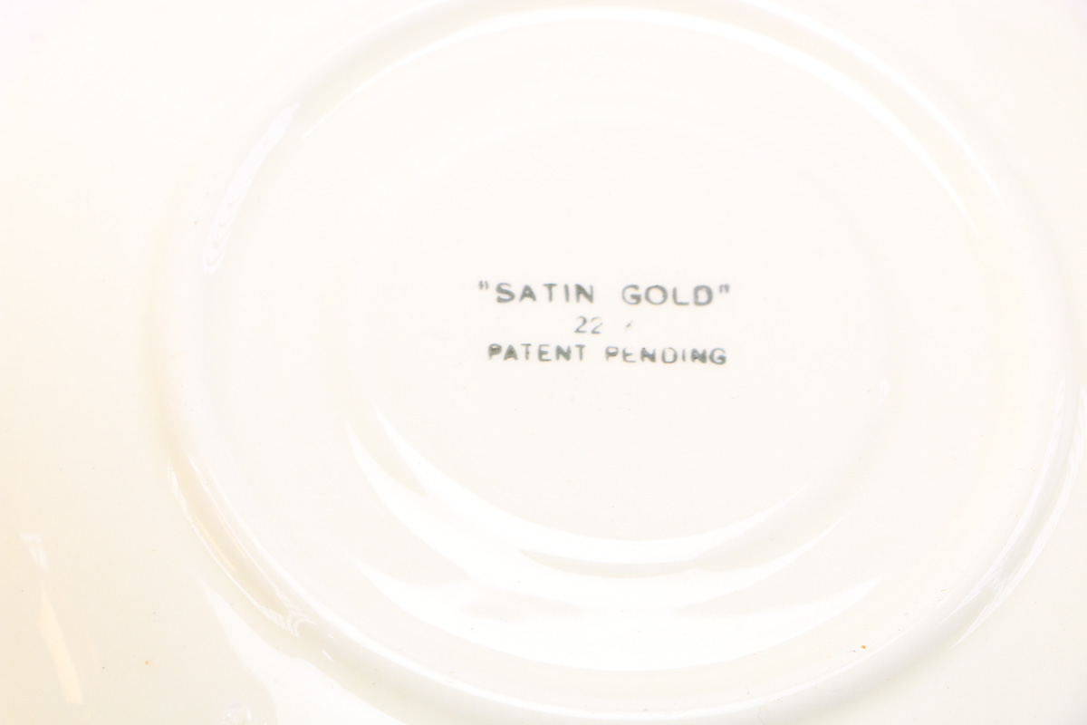 Atlas China Style 22K Gold Dipped Tea Cup And Saucer