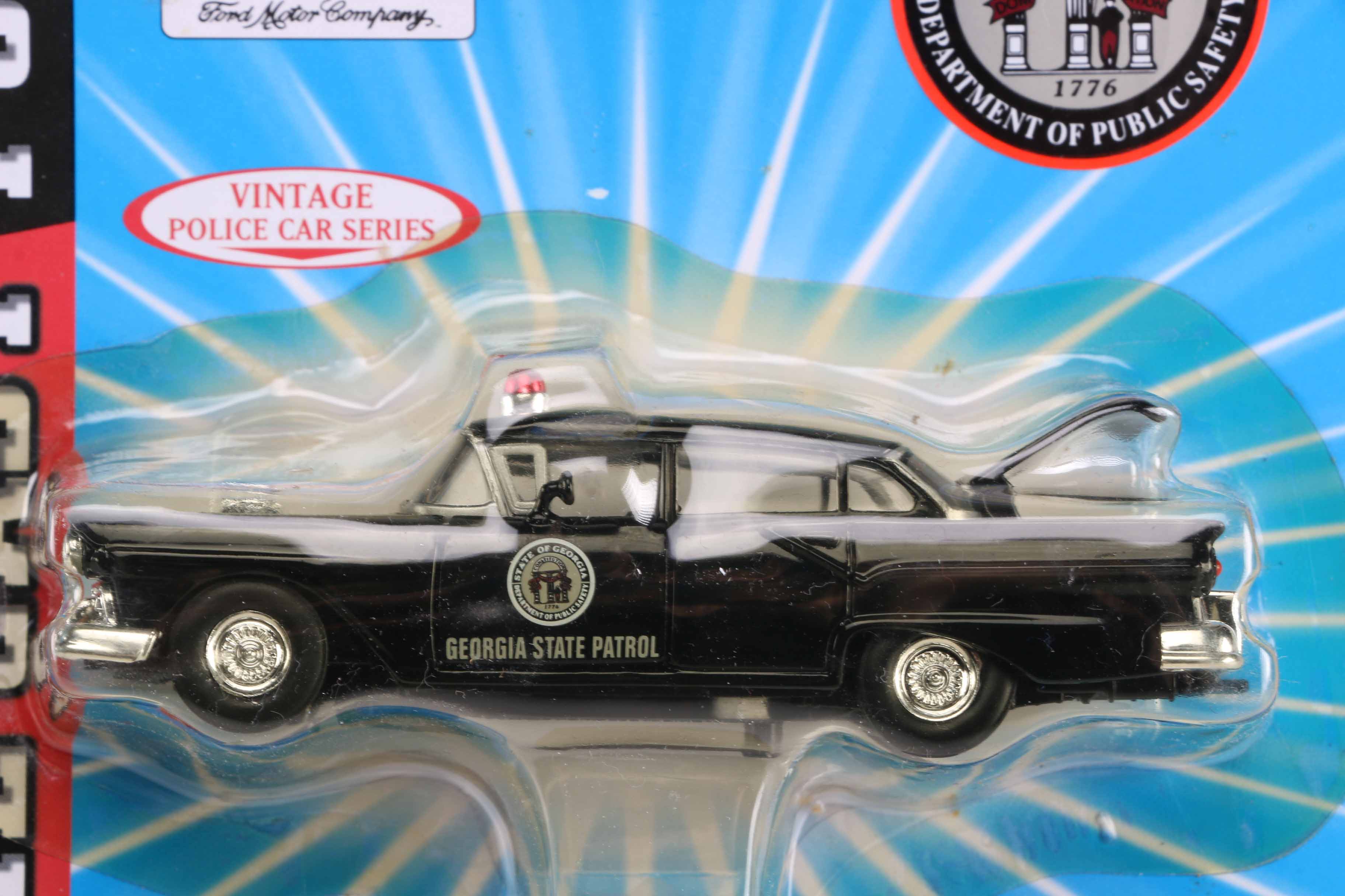 Assortment of Road Champs State Trooper Toy Cars