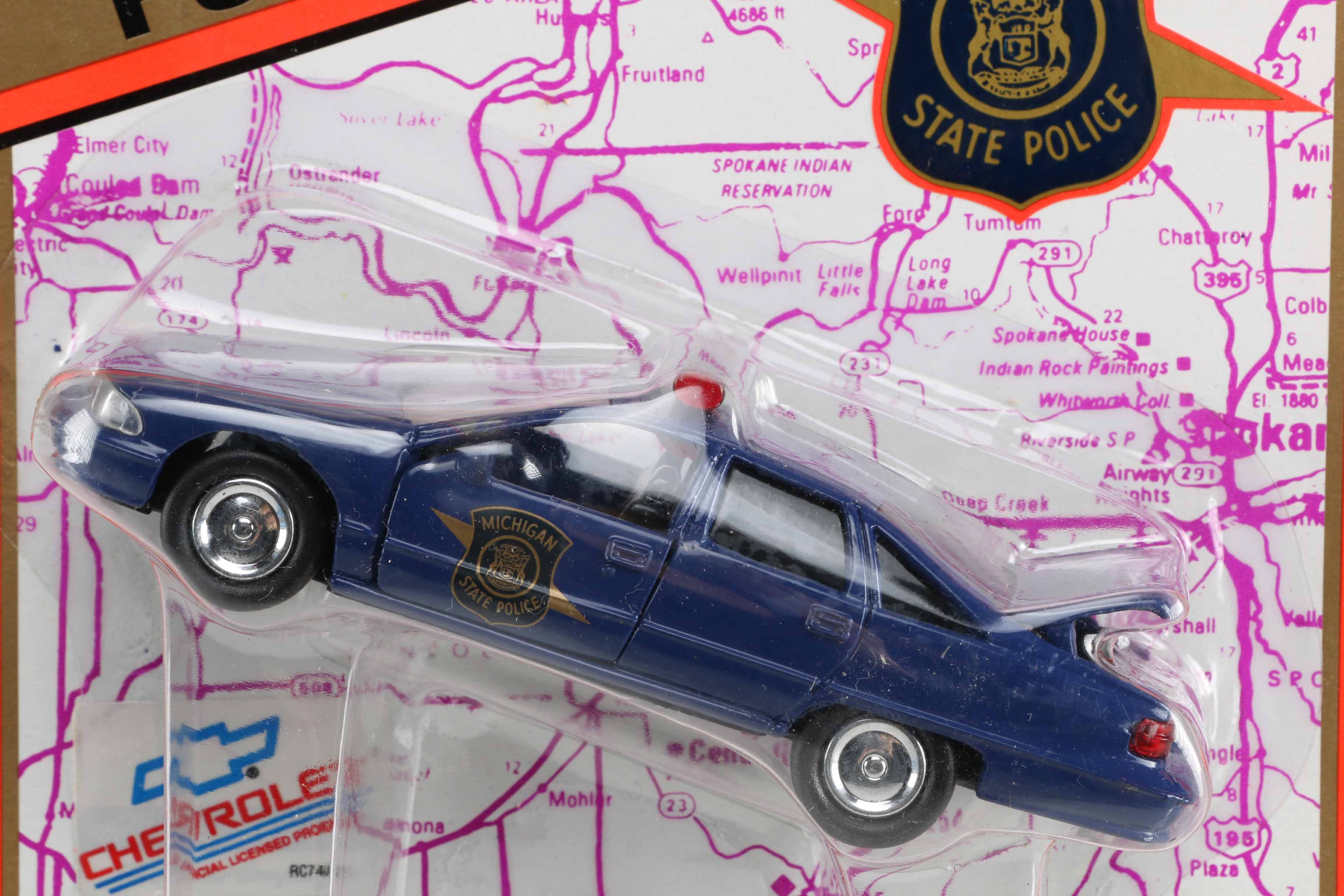 Assortment of Road Champs State Trooper Toy Cars