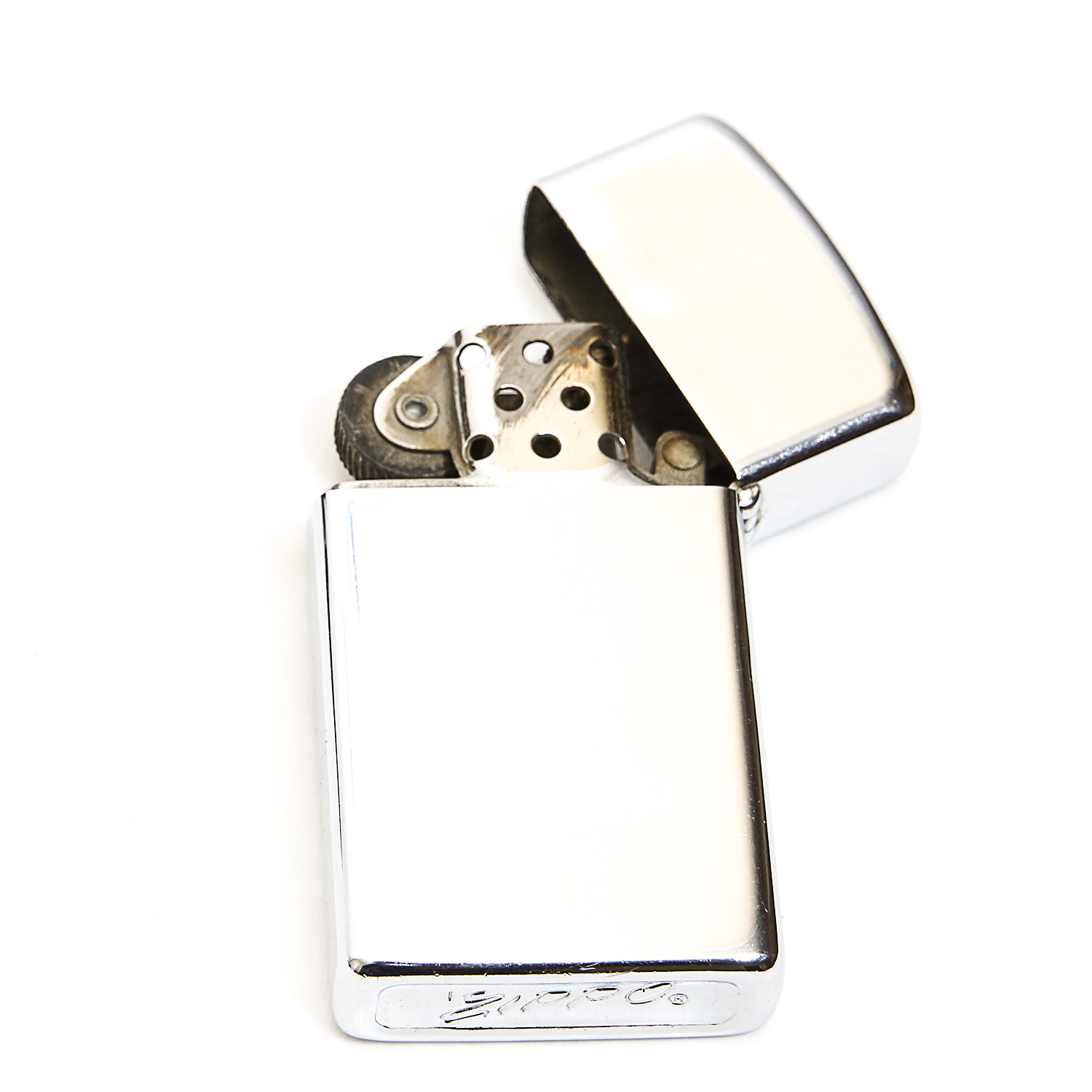 Vintage Black Tobacco Box with Gold Trim and a Zippo Lighter