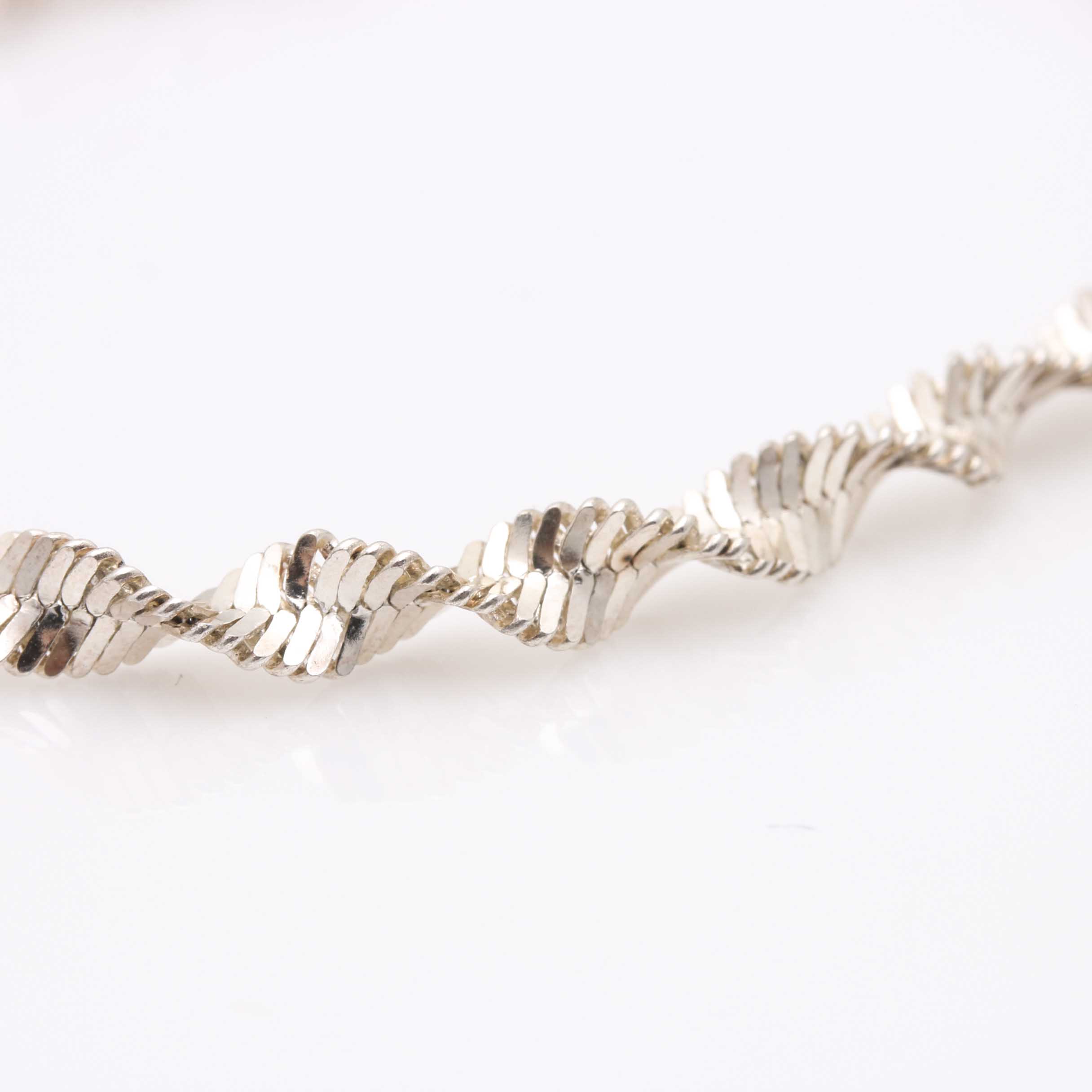 Selection of Sterling Silver Earrings, Bracelet, and a Ring