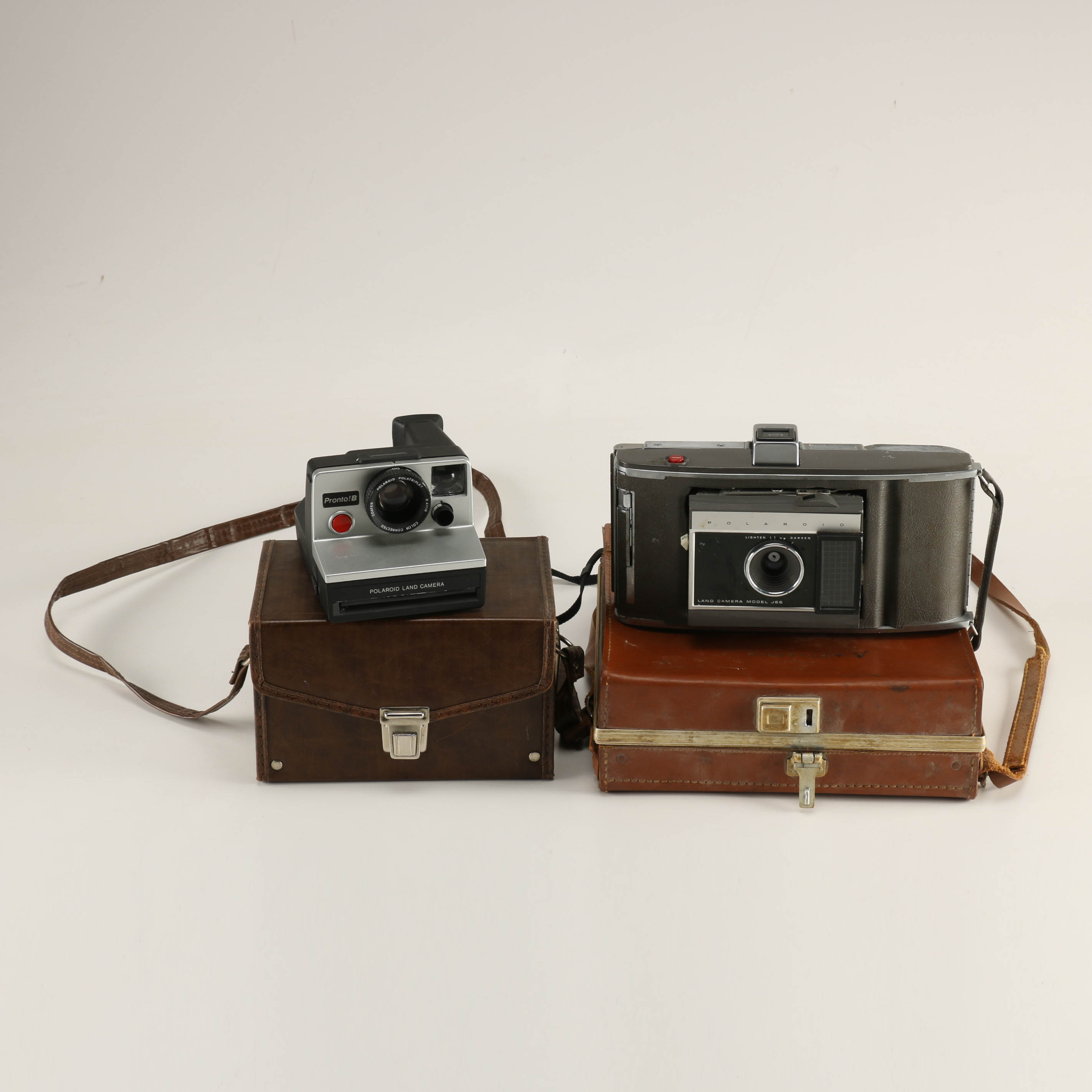 Polaroid Pronto!B and Model J66 Land Cameras with Accessories
