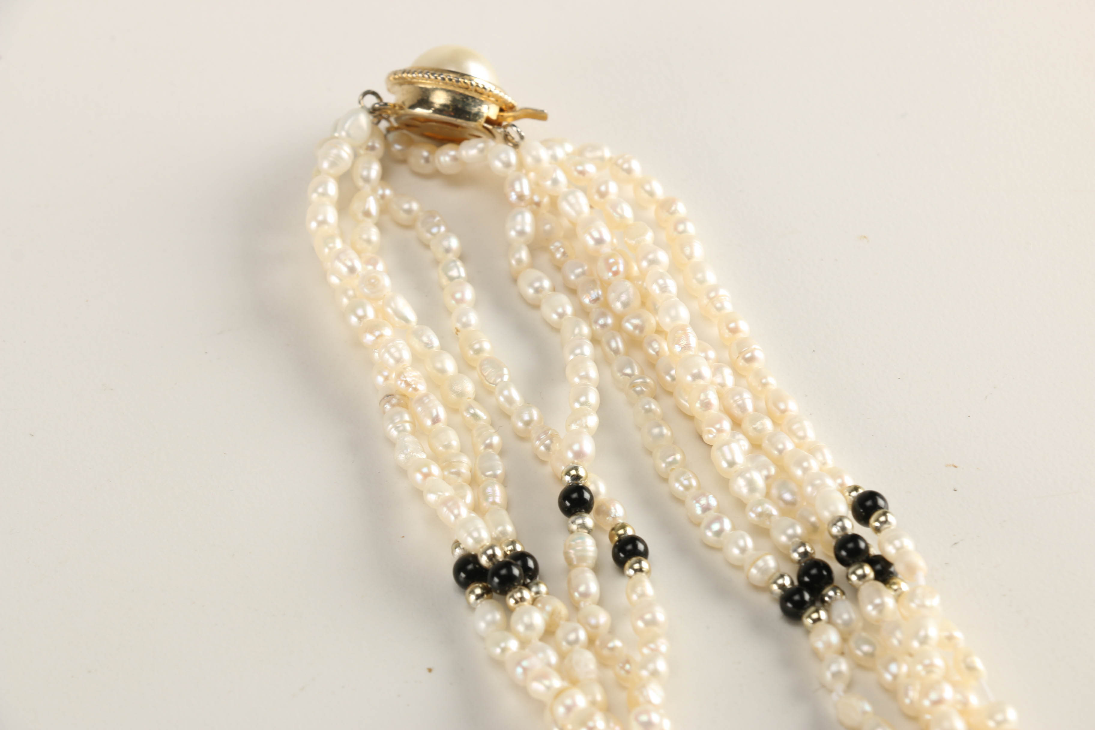 Assortment of Gold Toned Jewelry