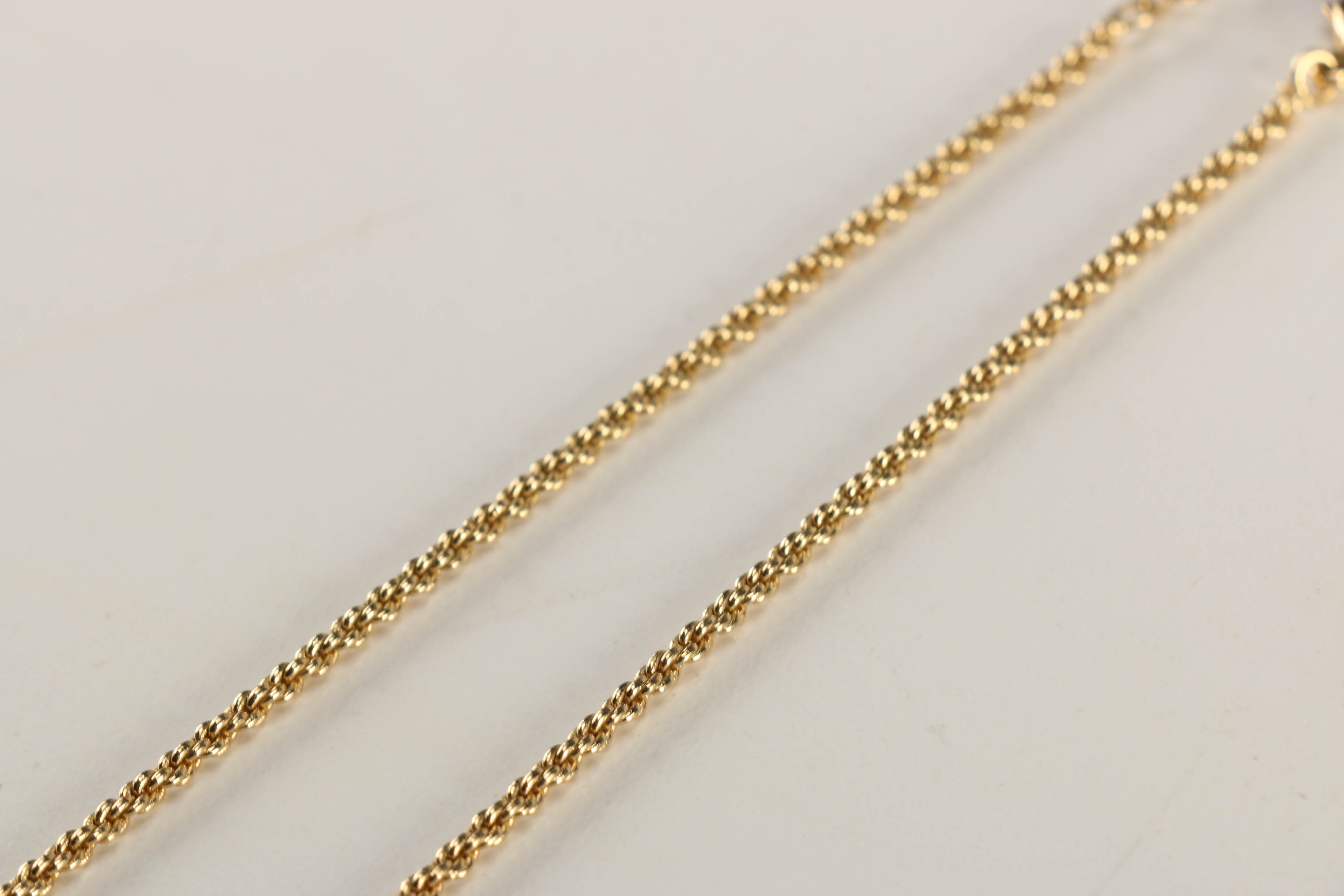 Assortment of Gold Toned Jewelry