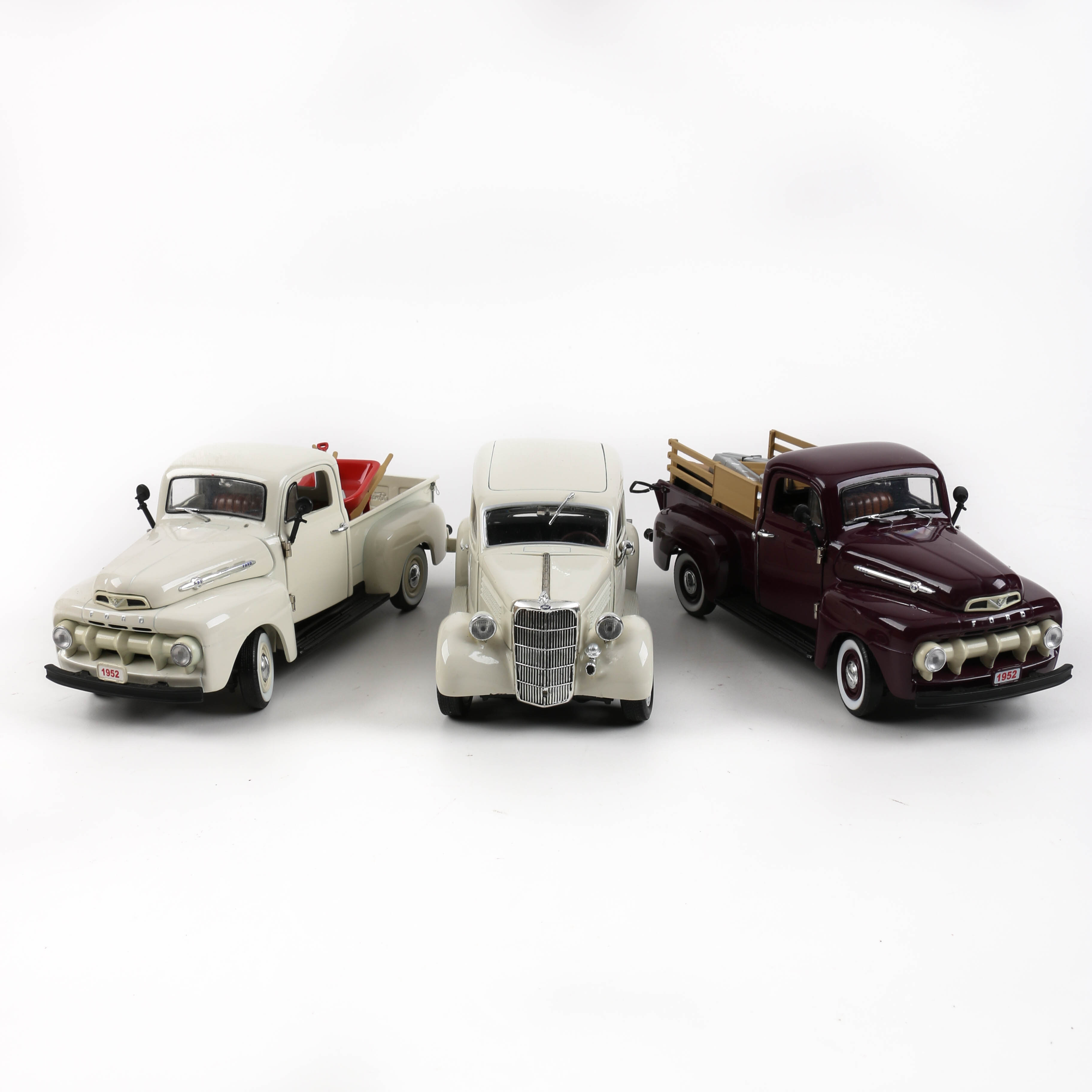 Three Die-Cast Ford Trucks