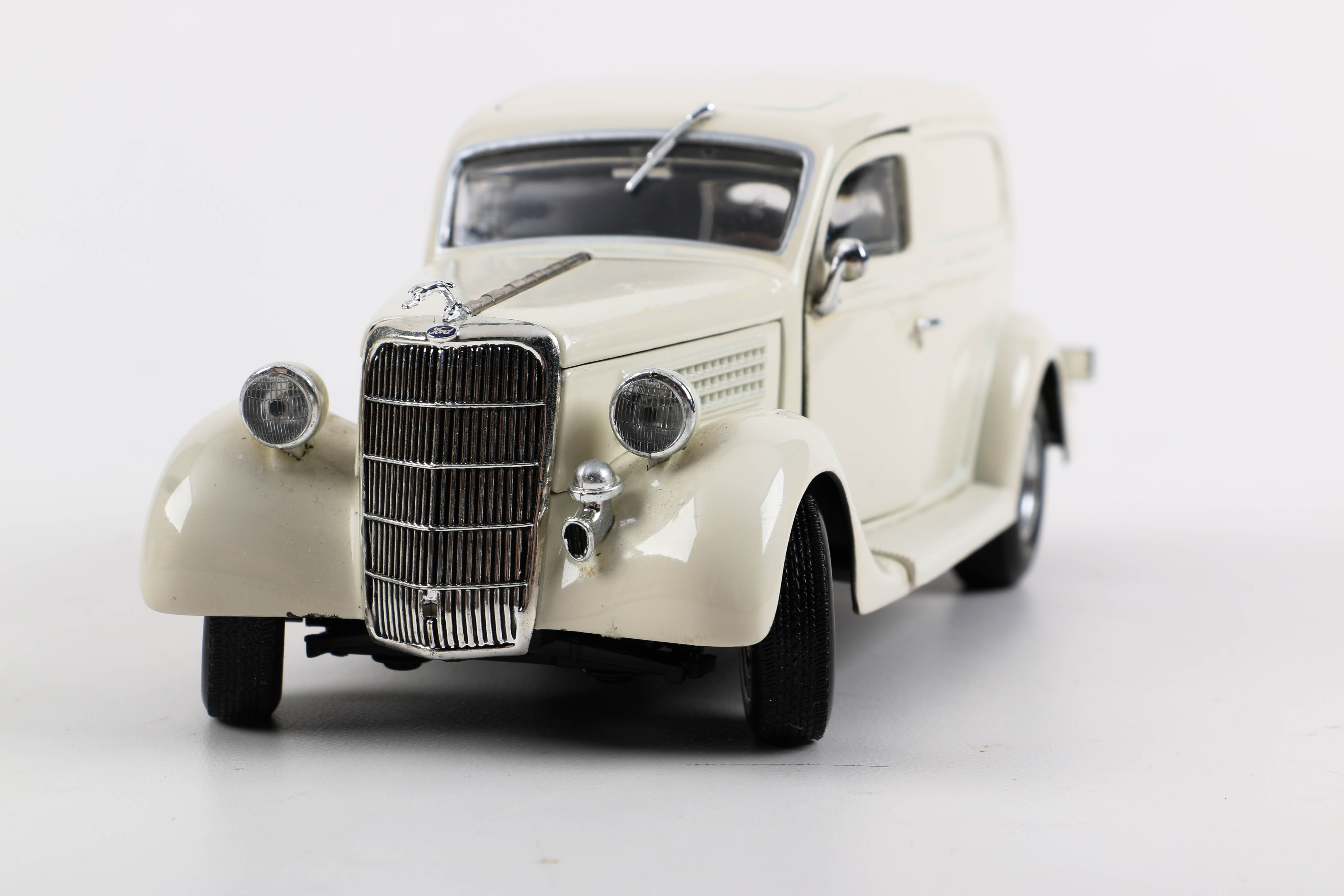 Three Die-Cast Ford Trucks