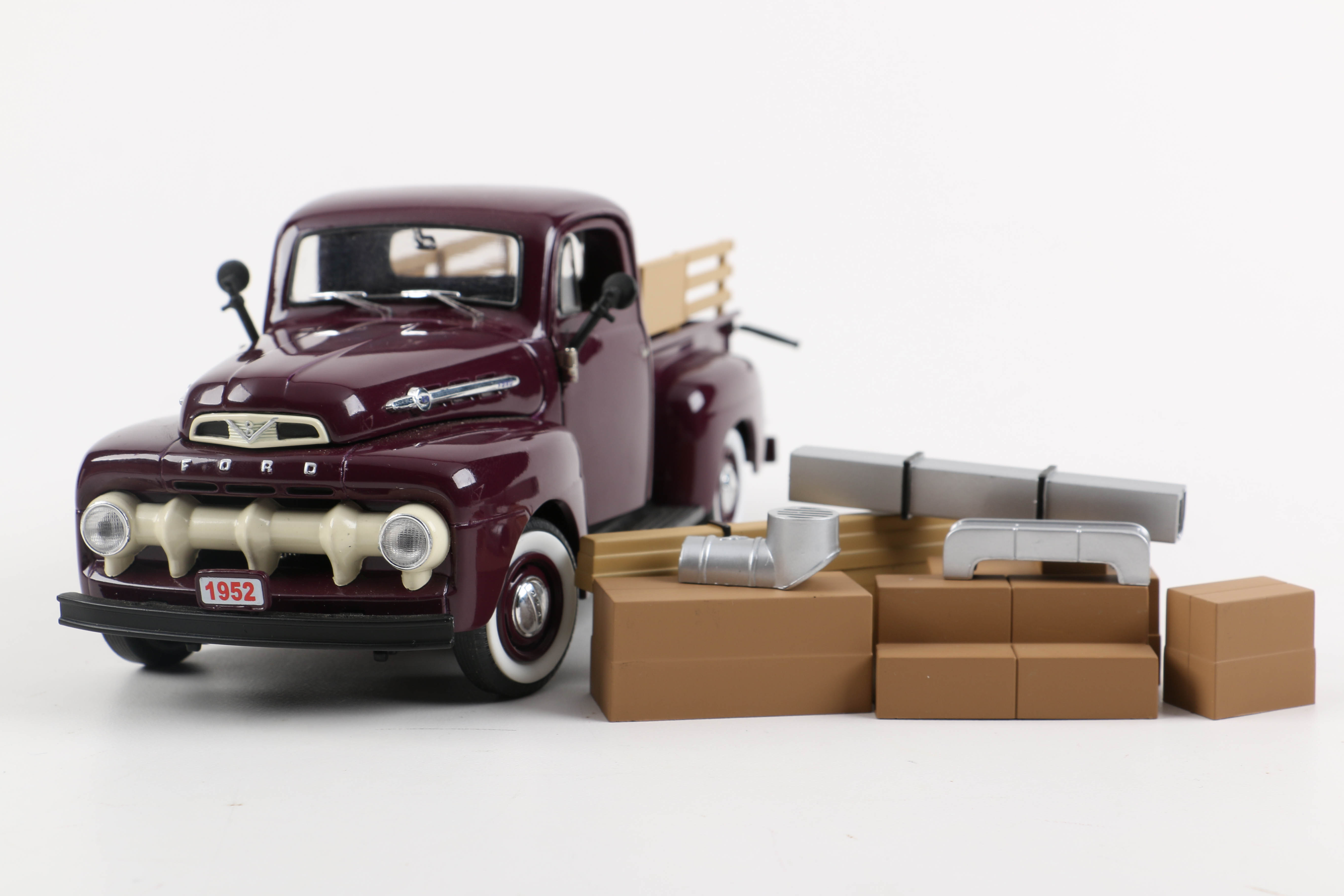 Three Die-Cast Ford Trucks