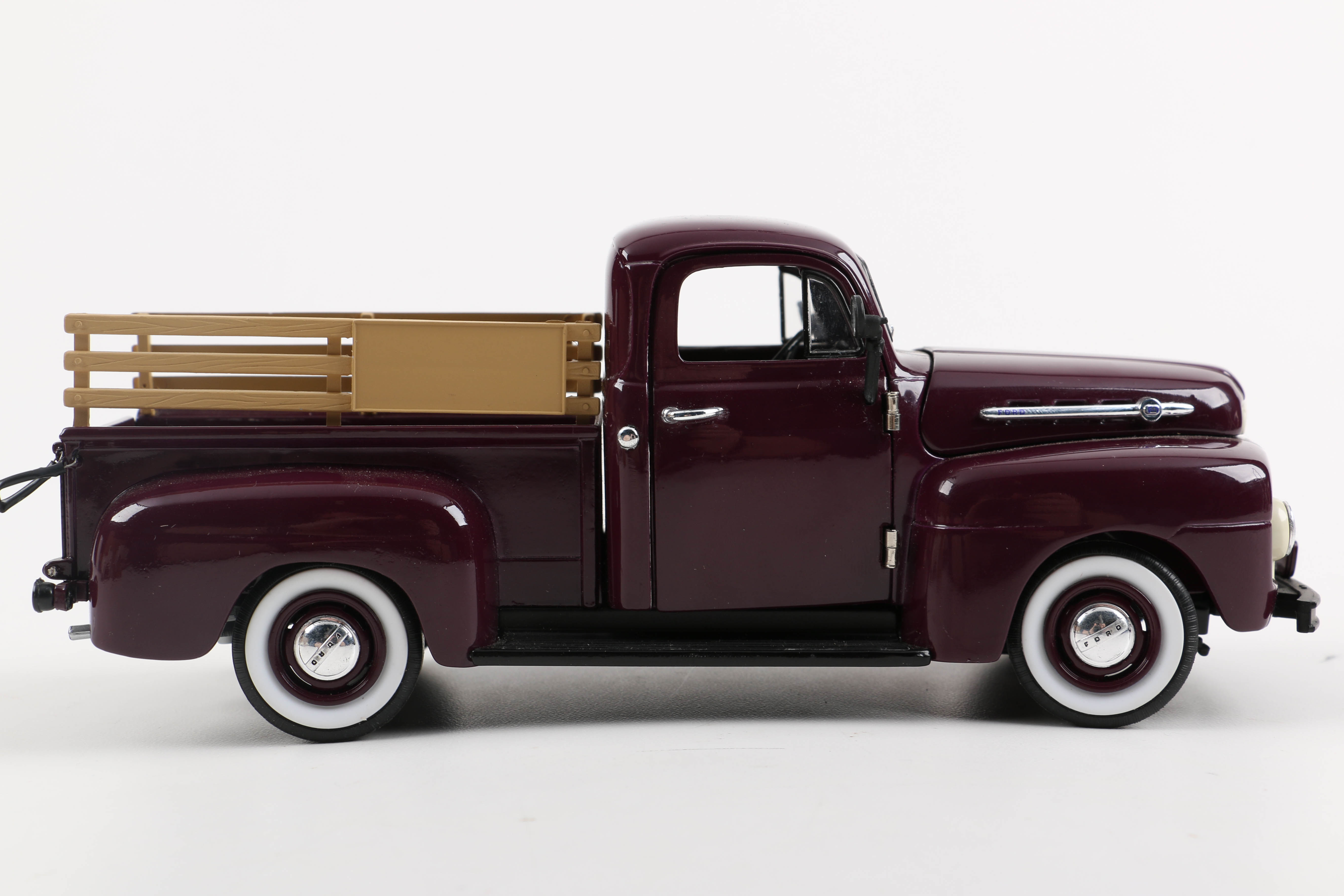 Three Die-Cast Ford Trucks