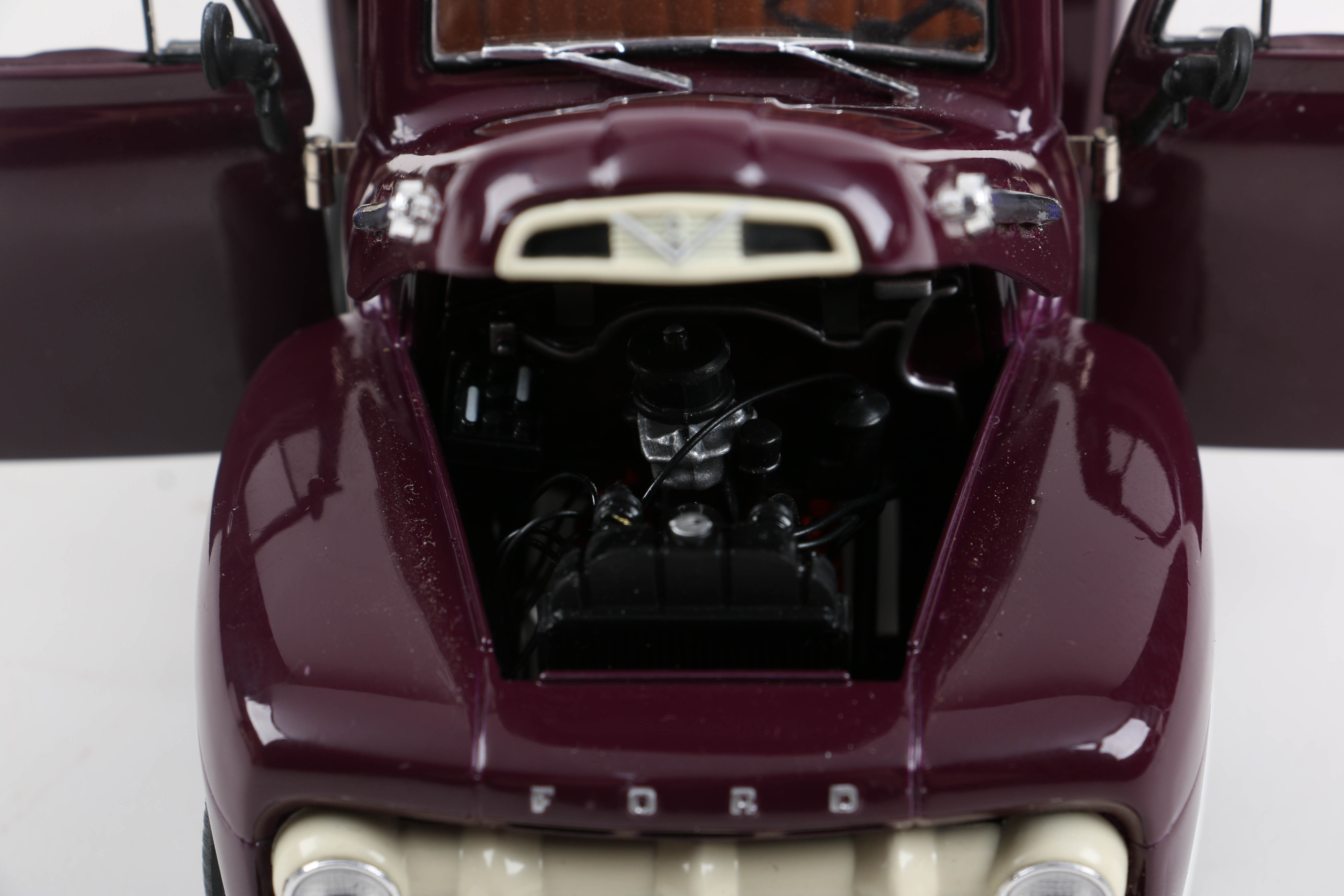 Three Die-Cast Ford Trucks