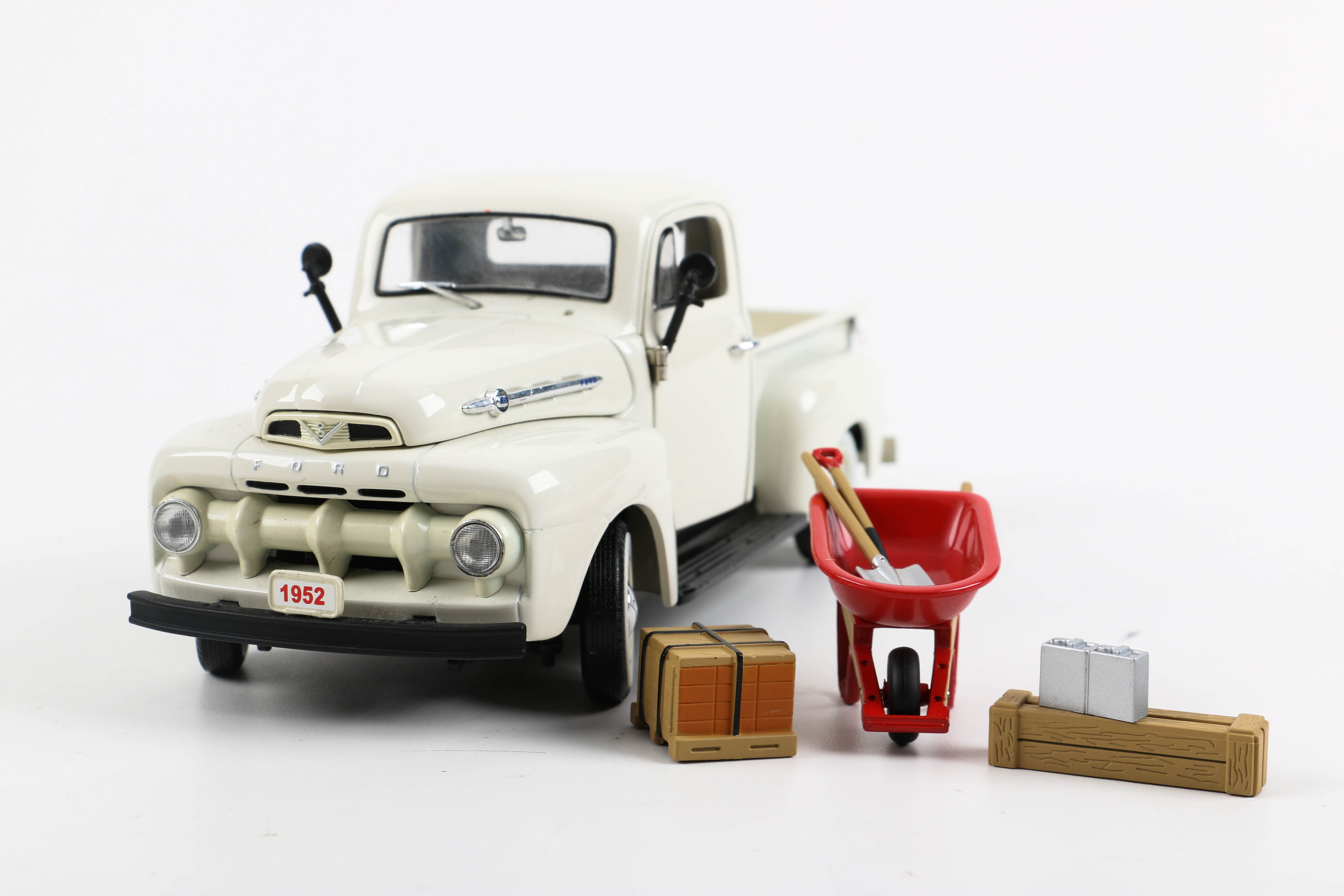 Three Die-Cast Ford Trucks