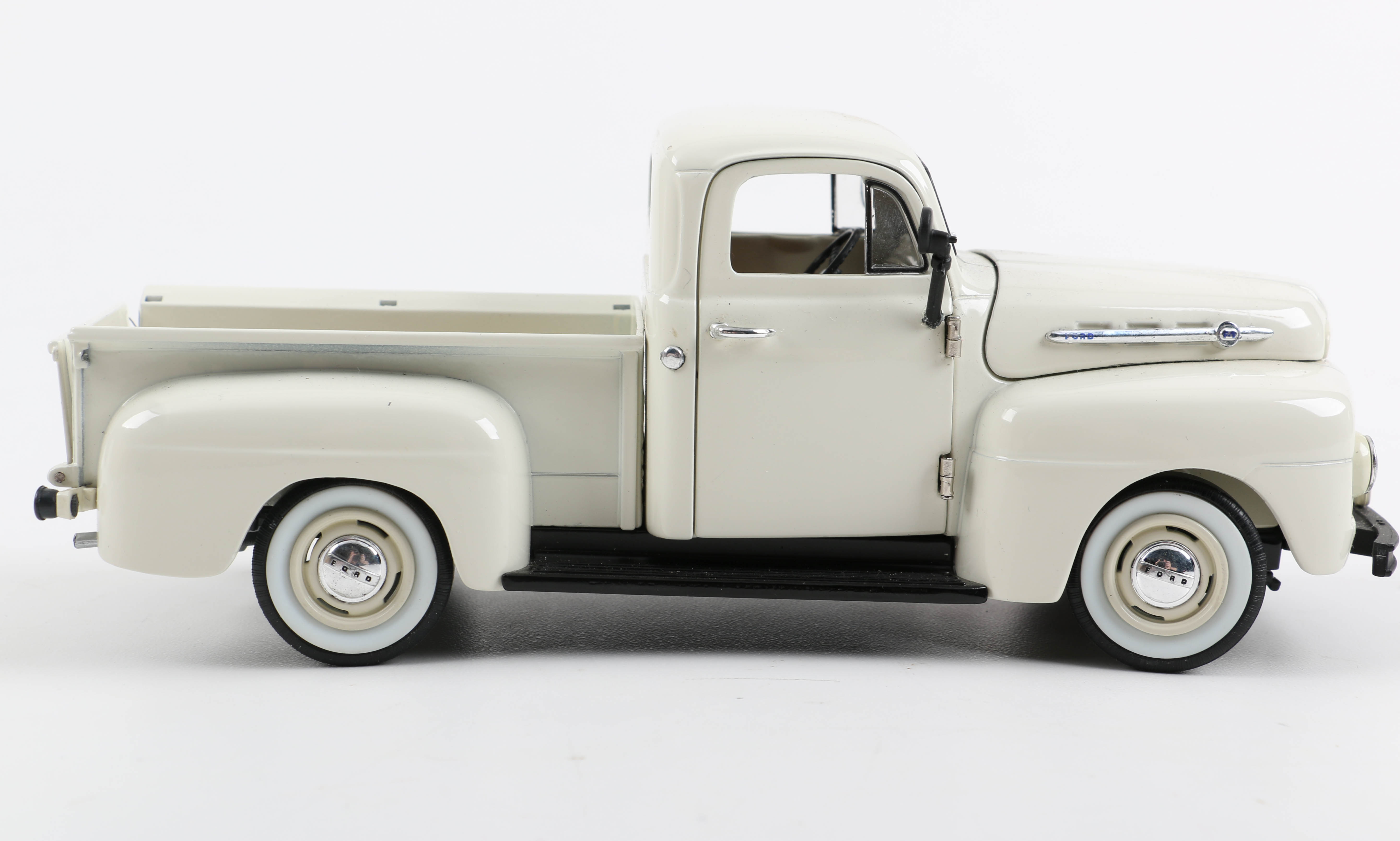 Three Die-Cast Ford Trucks