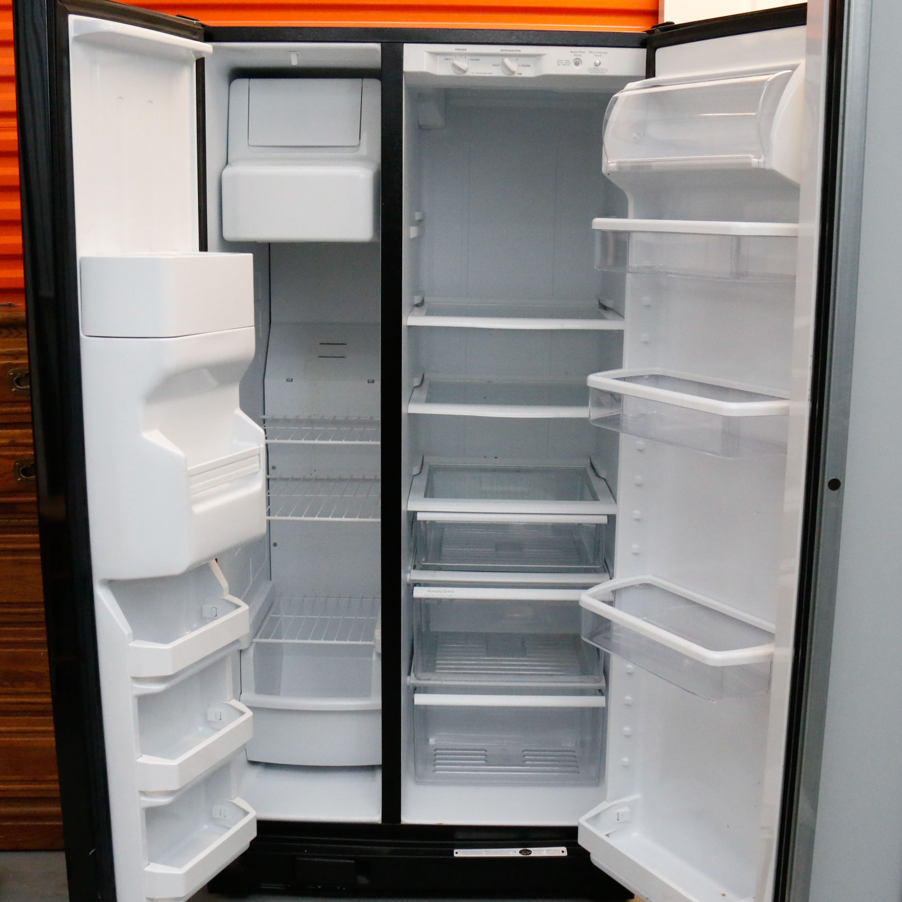 Black Side-by-Side Whirlpool Refrigerator Model Number WRS325FDAB02